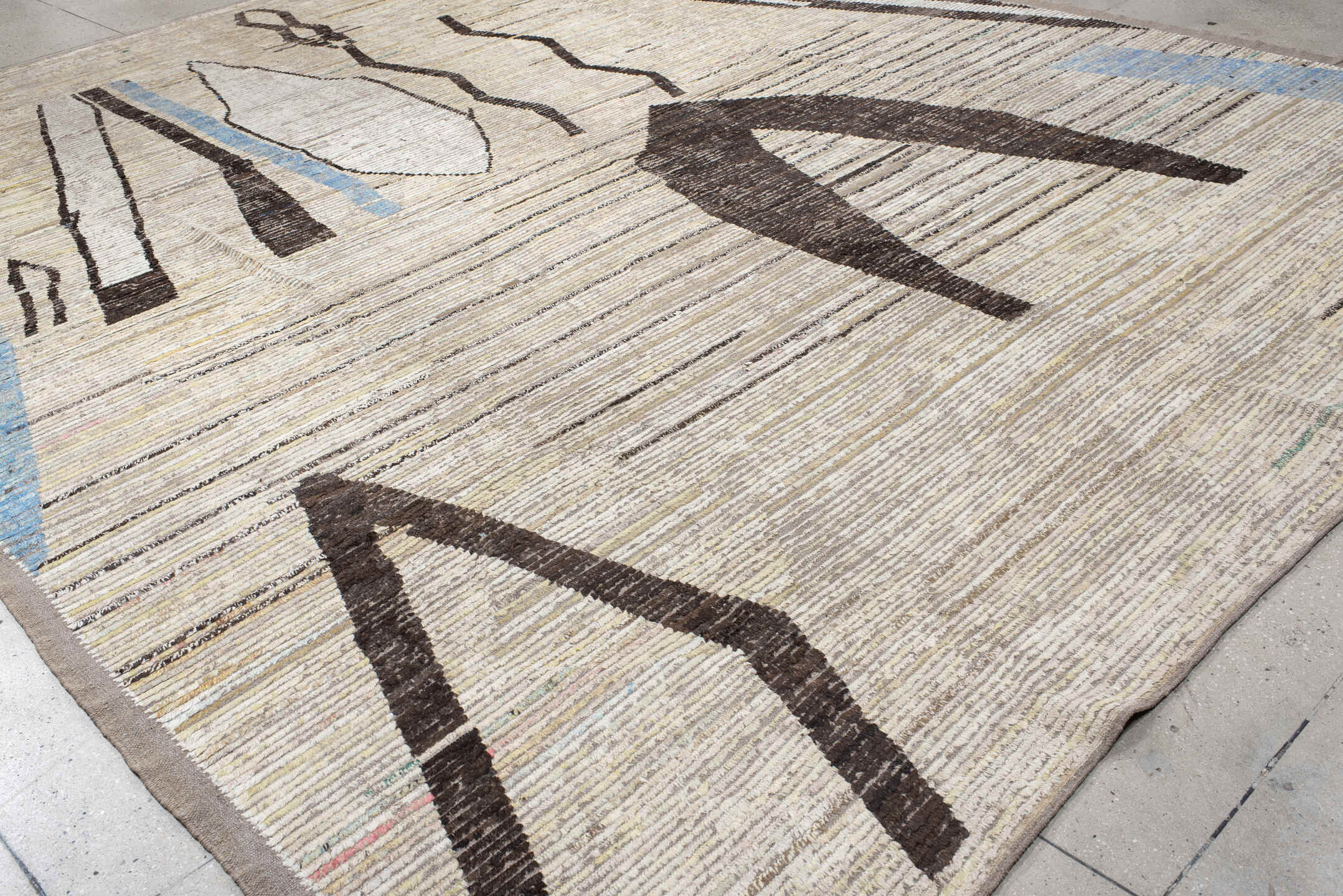 12' x 15' one-of-a-kind handmade vintage Tulu oversize rug. Color palette: blue, brown, floral white, gray, light blue