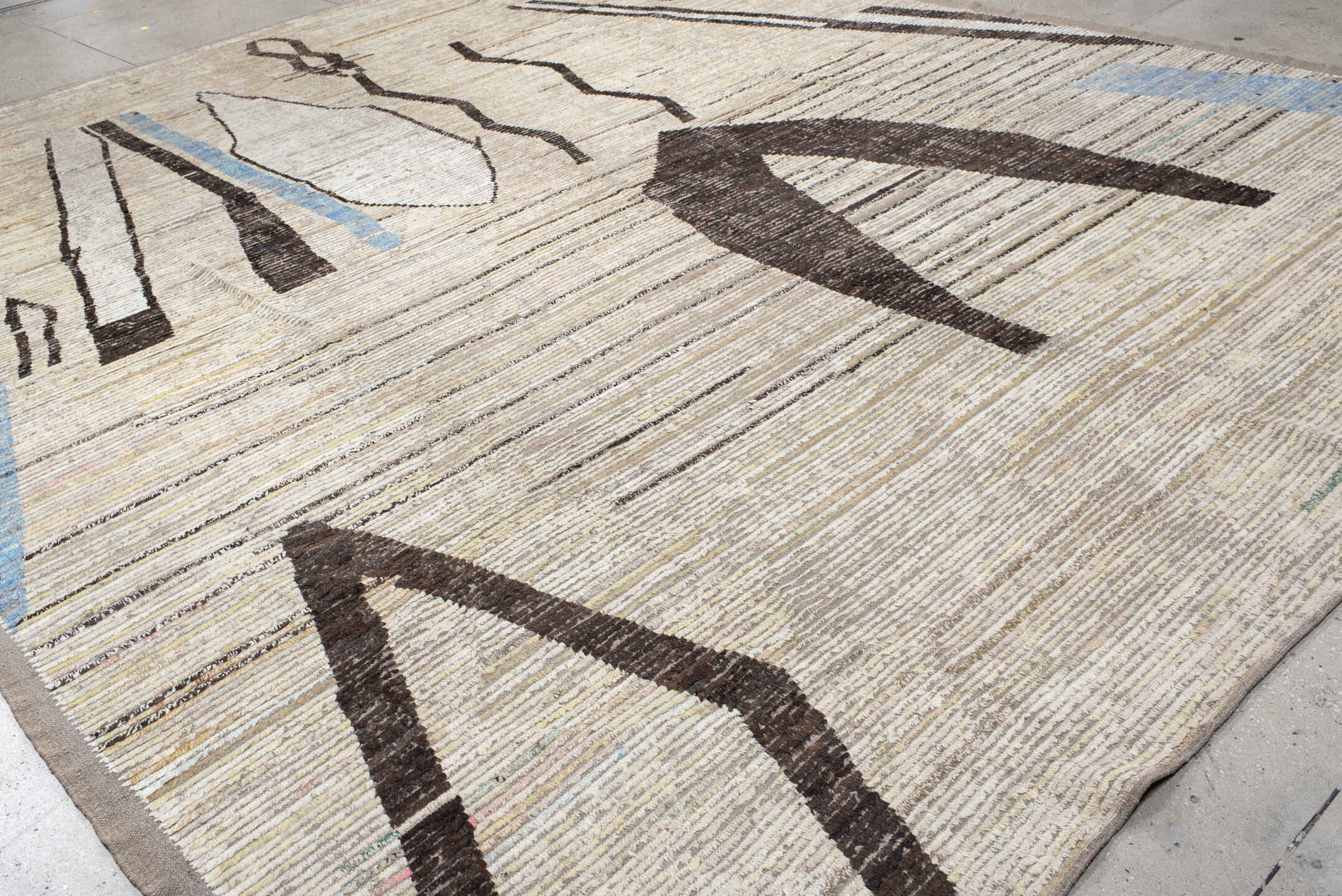 12' x 15' one-of-a-kind handmade vintage Tulu oversize rug. Color palette: blue, brown, floral white, gray, light blue