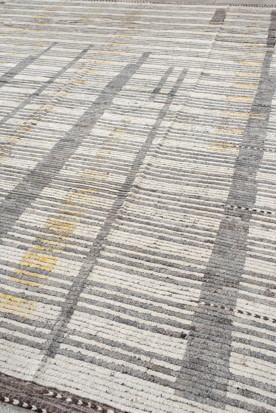 12' x 15' one-of-a-kind handmade vintage Tulu oversize rug. Color palette: ivory, gray, charcoal, gold, taupe, black, beige