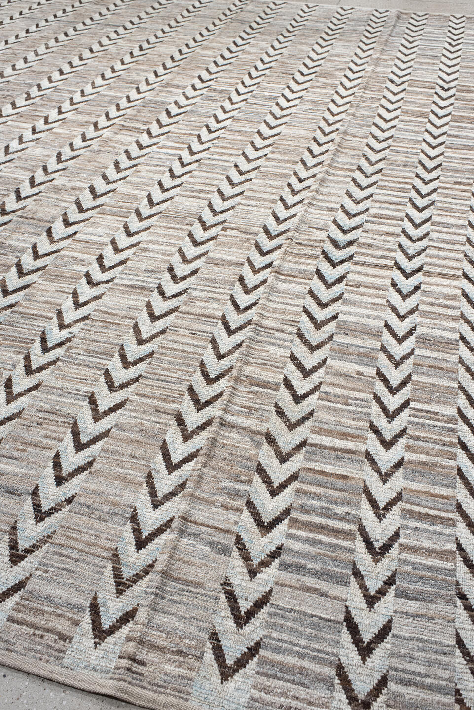 12' x 15' one-of-a-kind handmade vintage Tulu oversize rug. Color palette: ivory, taupe, brown, gray, charcoal, beige, black