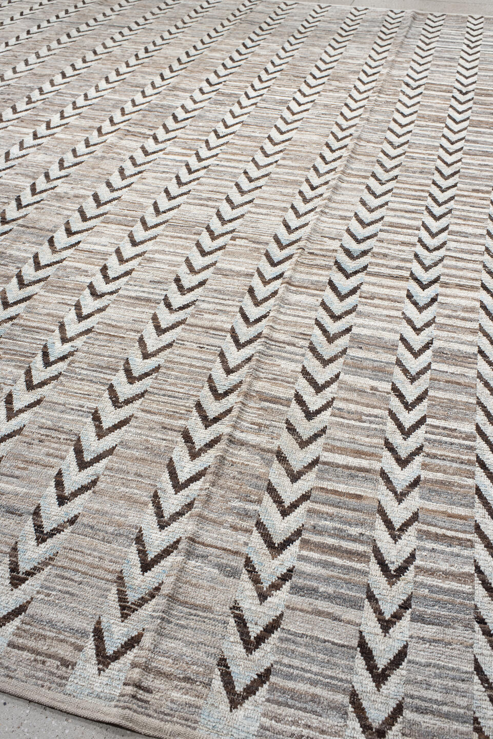 12' x 15' one-of-a-kind handmade vintage Tulu oversize rug. Color palette: ivory, taupe, brown, gray, charcoal, beige, black