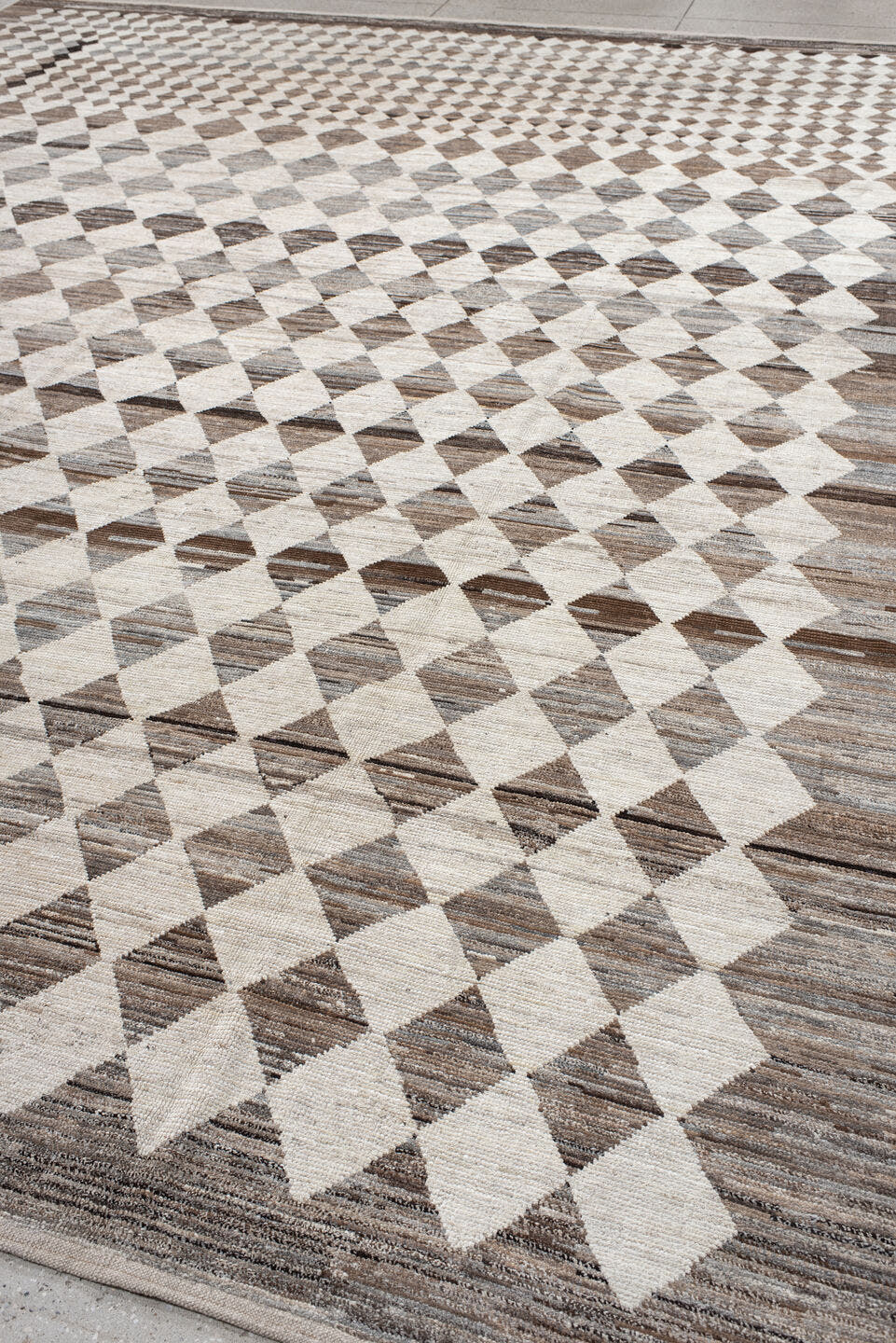 12' x 15' one-of-a-kind handmade vintage Tulu oversize rug. Color palette: ivory, taupe, brown, gray, charcoal, beige, black