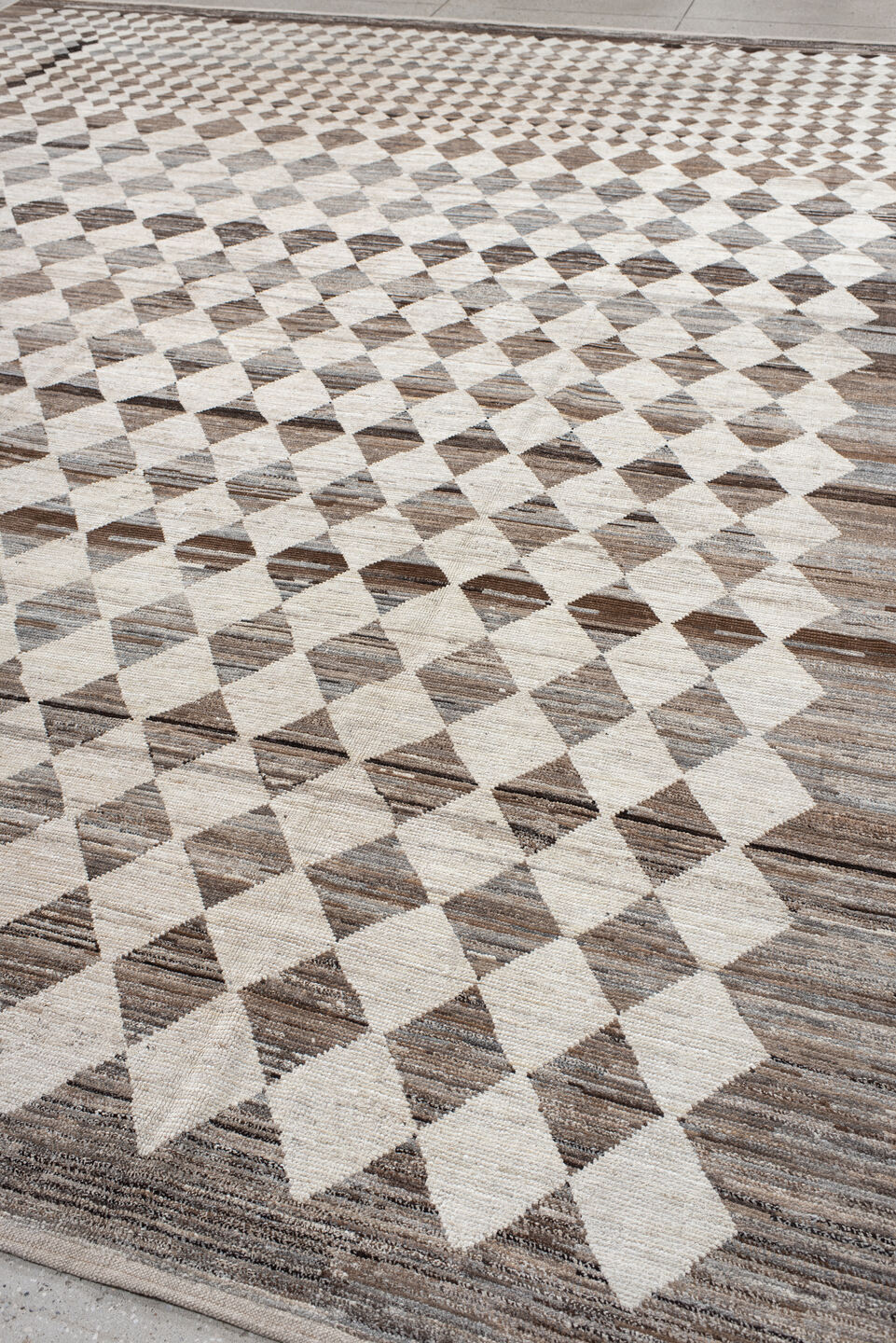 12' x 15' one-of-a-kind handmade vintage Tulu oversize rug. Color palette: ivory, taupe, brown, gray, charcoal, beige, black