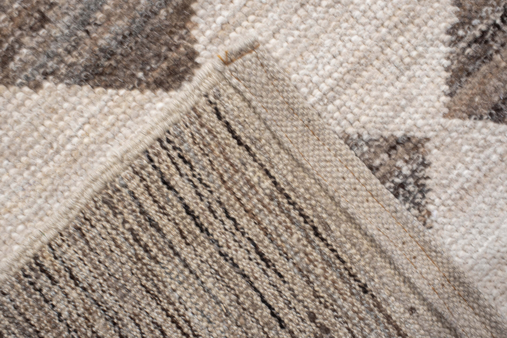 12' x 15' one-of-a-kind handmade vintage Tulu oversize rug. Color palette: ivory, taupe, brown, gray, charcoal, beige, black