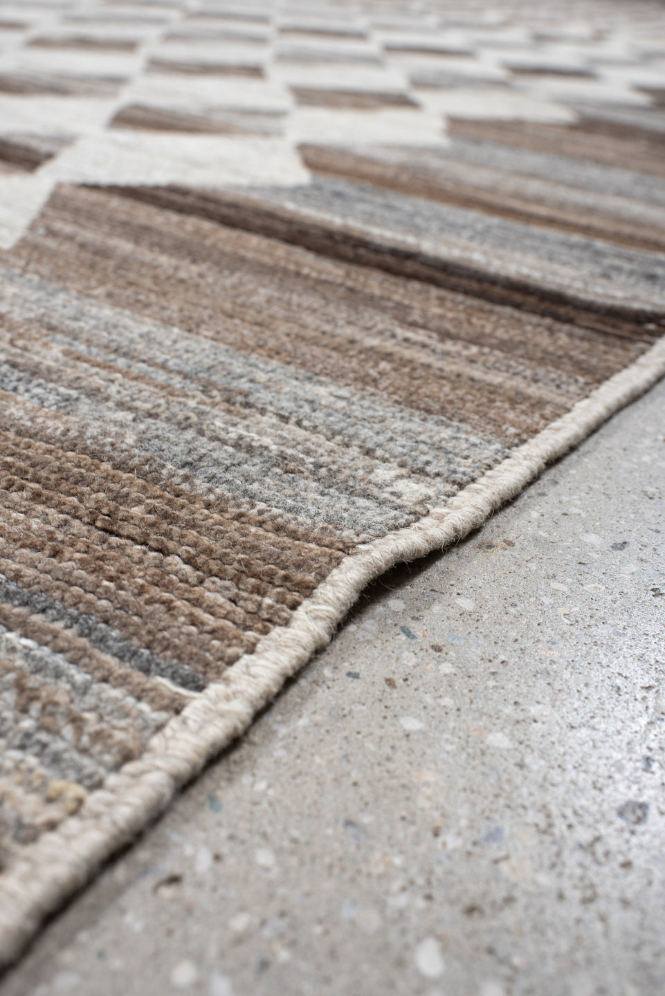 12' x 15' one-of-a-kind handmade vintage Tulu oversize rug. Color palette: ivory, taupe, brown, gray, charcoal, beige, black
