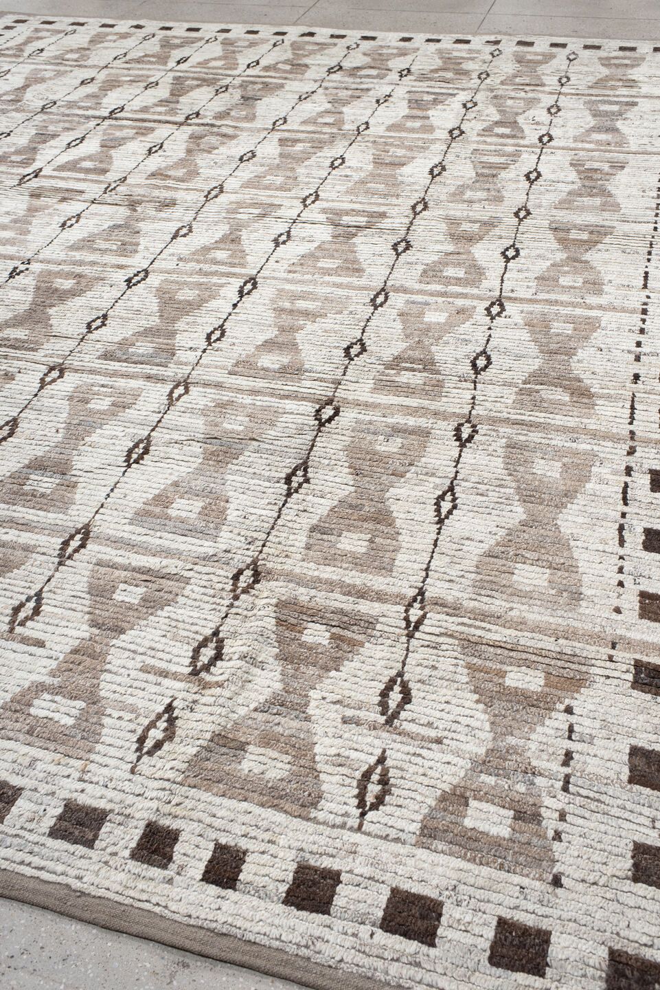 12' x 14' one-of-a-kind handmade vintage Tulu oversize rug. Color palette: ivory, taupe, brown, charcoal, beige, gray, black