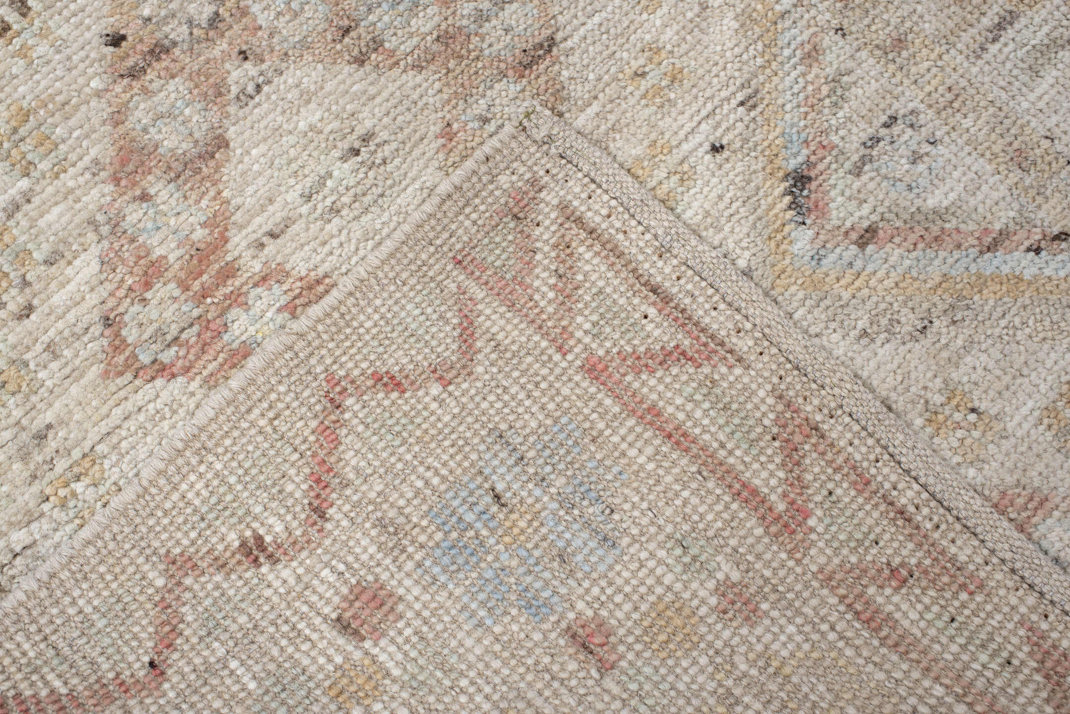 2' x 10' one-of-a-kind handmade vintage Tulu runner rug. Color palette: ivory, blush, pale blue, beige, taupe, sage, camel