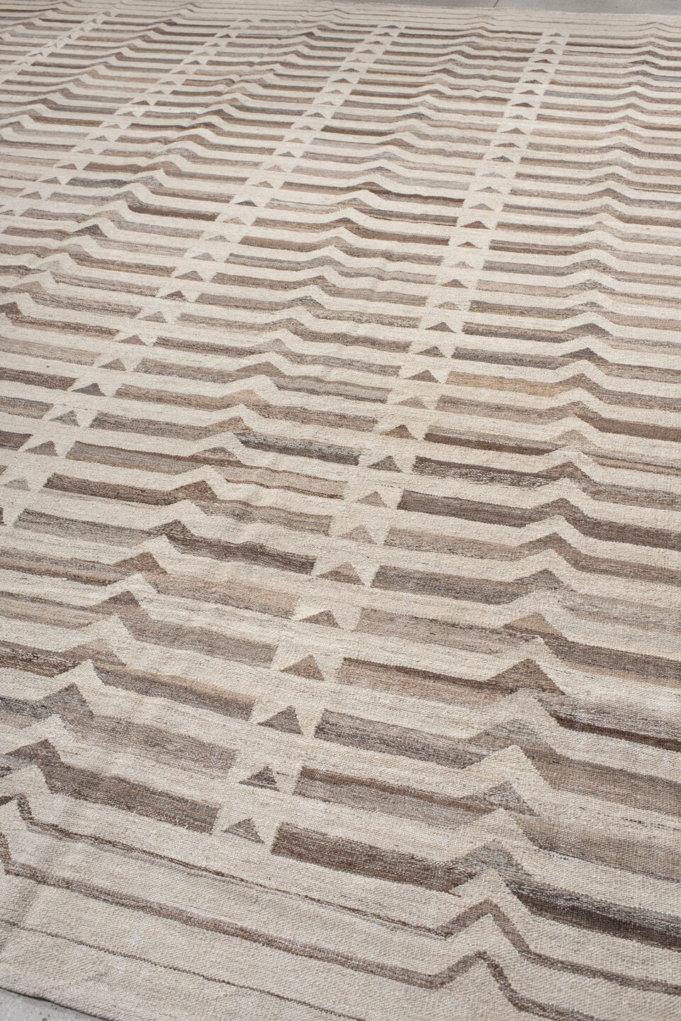 12' x 16' one-of-a-kind handmade vintage Kilim oversize rug. Color palette: ivory, taupe, beige, brown, gray