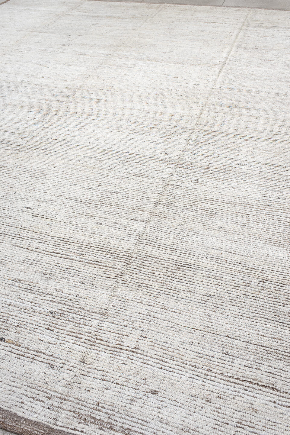 12' x 15' one-of-a-kind handmade vintage Tulu oversize rug. Color palette: ivory, taupe, beige, gray