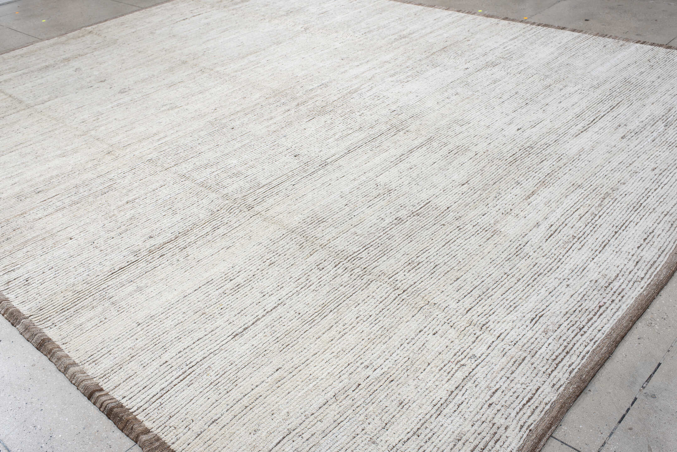 12' x 15' one-of-a-kind handmade vintage Tulu oversize rug. Color palette: ivory, taupe, beige, gray
