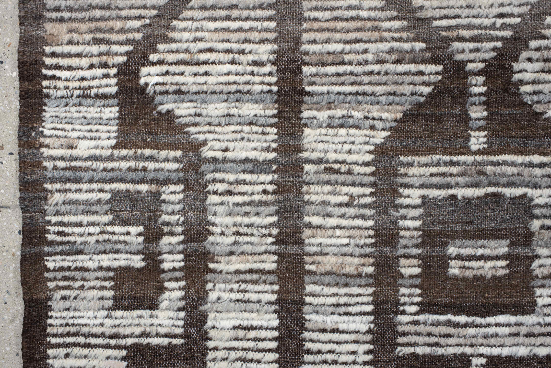 13' x 15' one-of-a-kind handmade vintage Tulu oversize rug. Color palette: ivory, brown, taupe, charcoal, beige, gray, black
