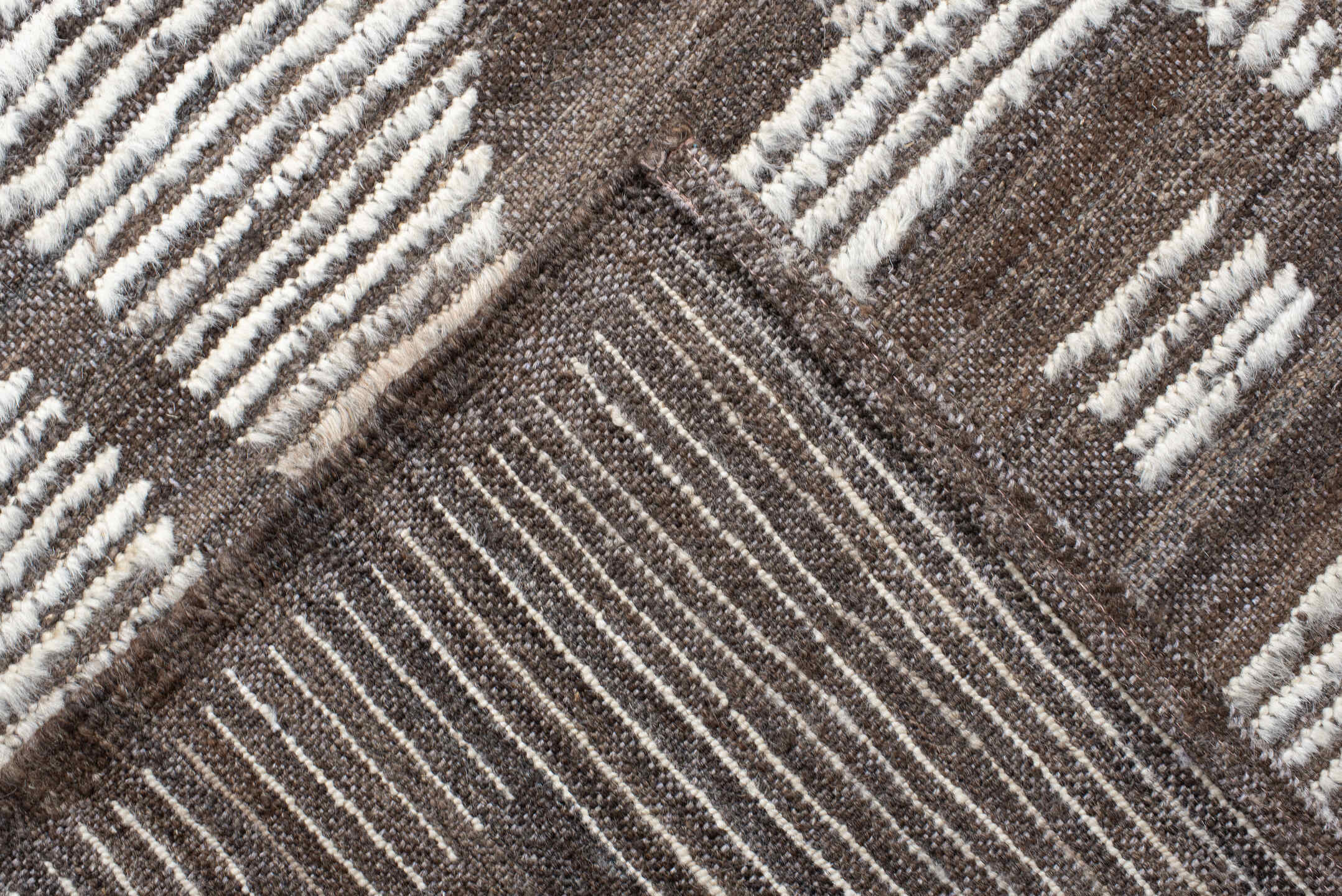 13' x 15' one-of-a-kind handmade vintage Tulu oversize rug. Color palette: ivory, brown, taupe, charcoal, beige, gray, black