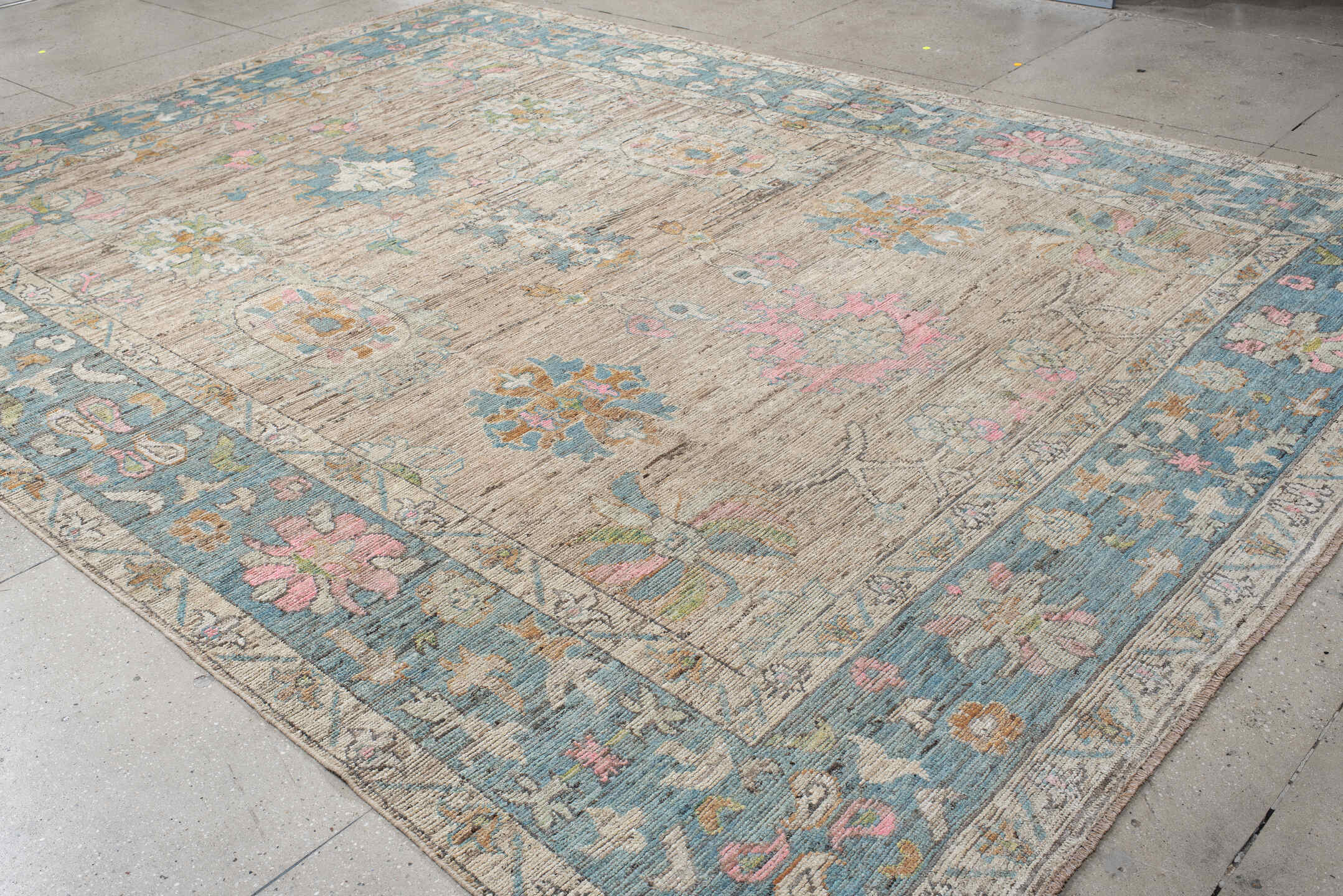 10' x 14' one-of-a-kind handmade vintage Oushak large size rug. Color palette: ivory, sky blue, pink, sage, gold, taupe
