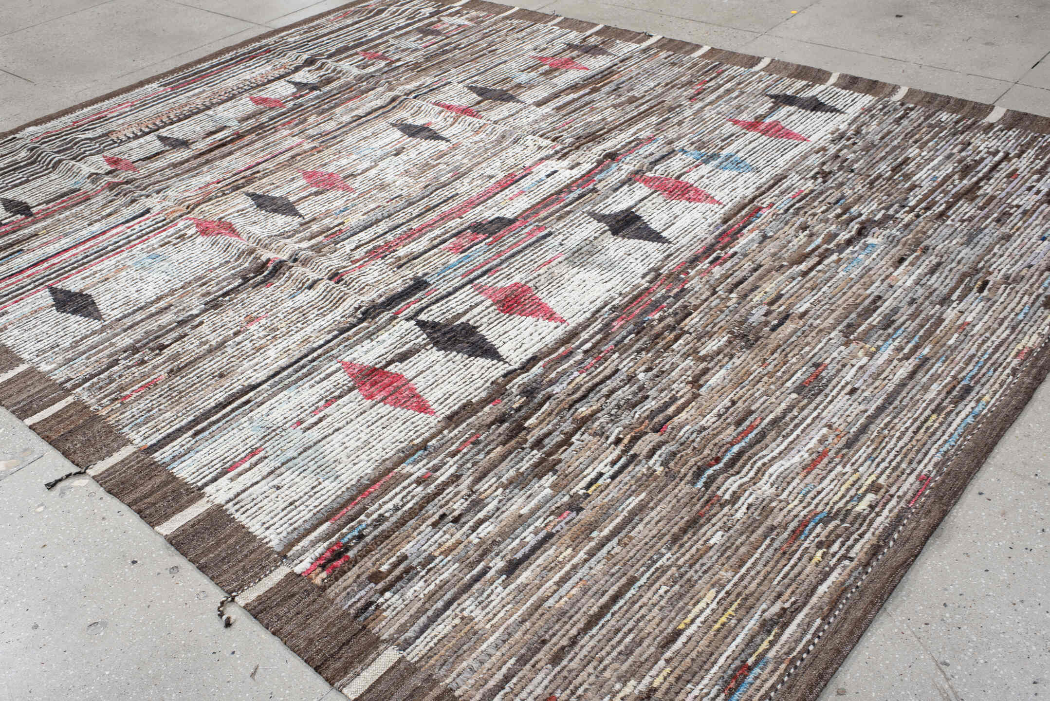 9' x 11' one-of-a-kind handmade vintage Tulu large size rug. Color palette: ivory, brown, charcoal, crimson, sky_blue, taupe