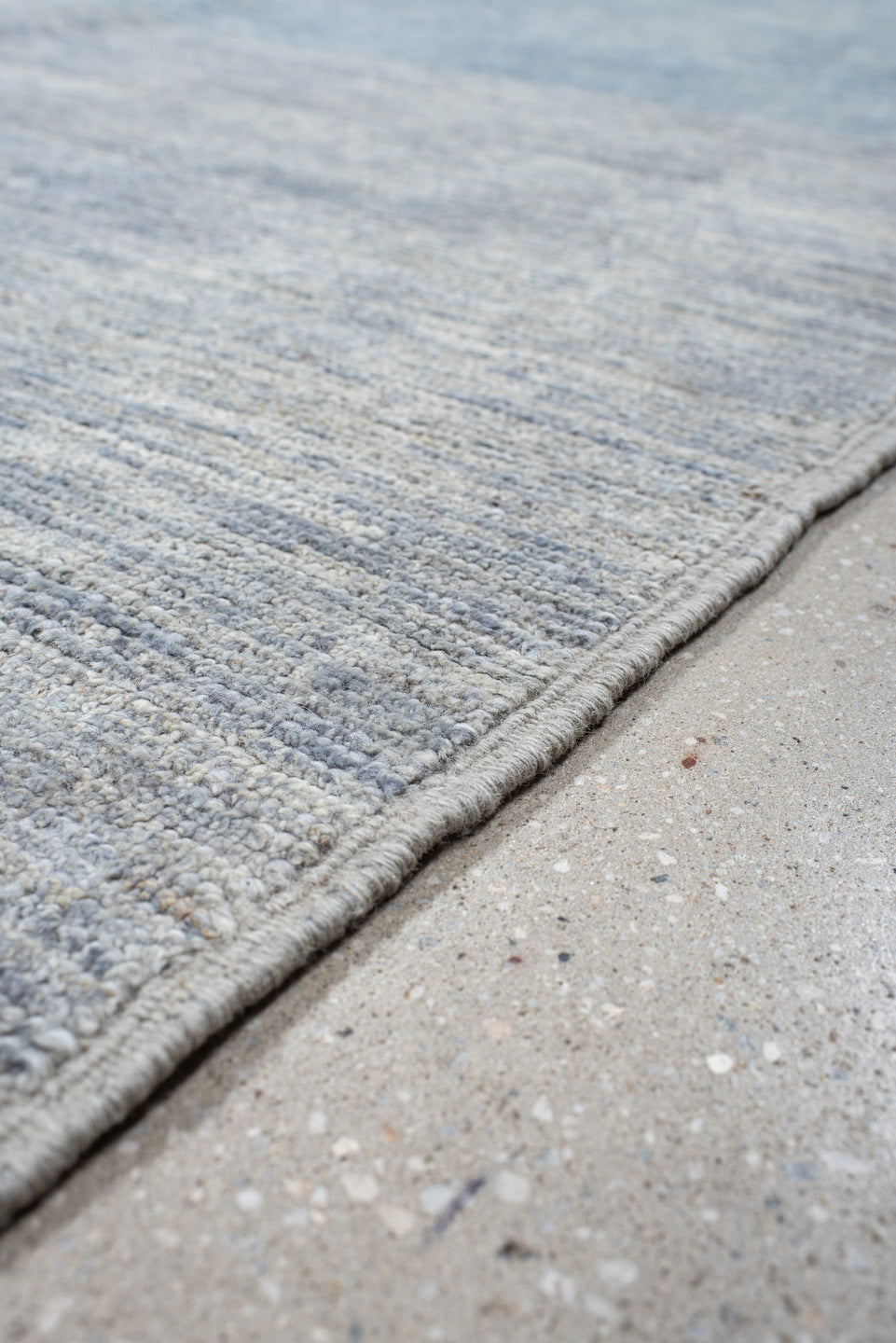 9' x 12' one-of-a-kind handmade vintage Tulu large size rug. Color palette: pale blue, ivory, silver, slate, light blue