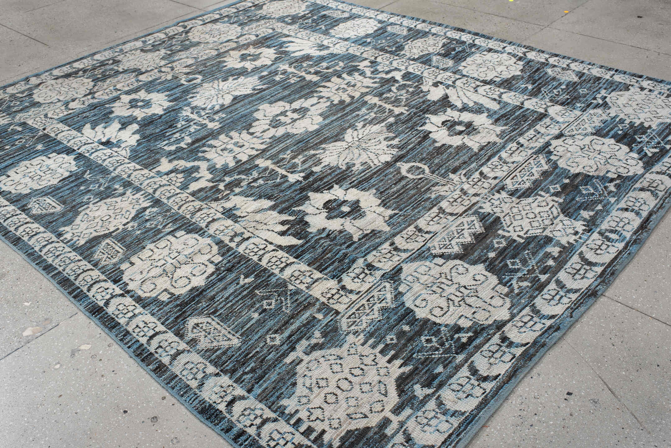8' x 9' one-of-a-kind handmade vintage Oushak rug. Color palette: blue, ivory, charcoal, slate, cream, gray, black