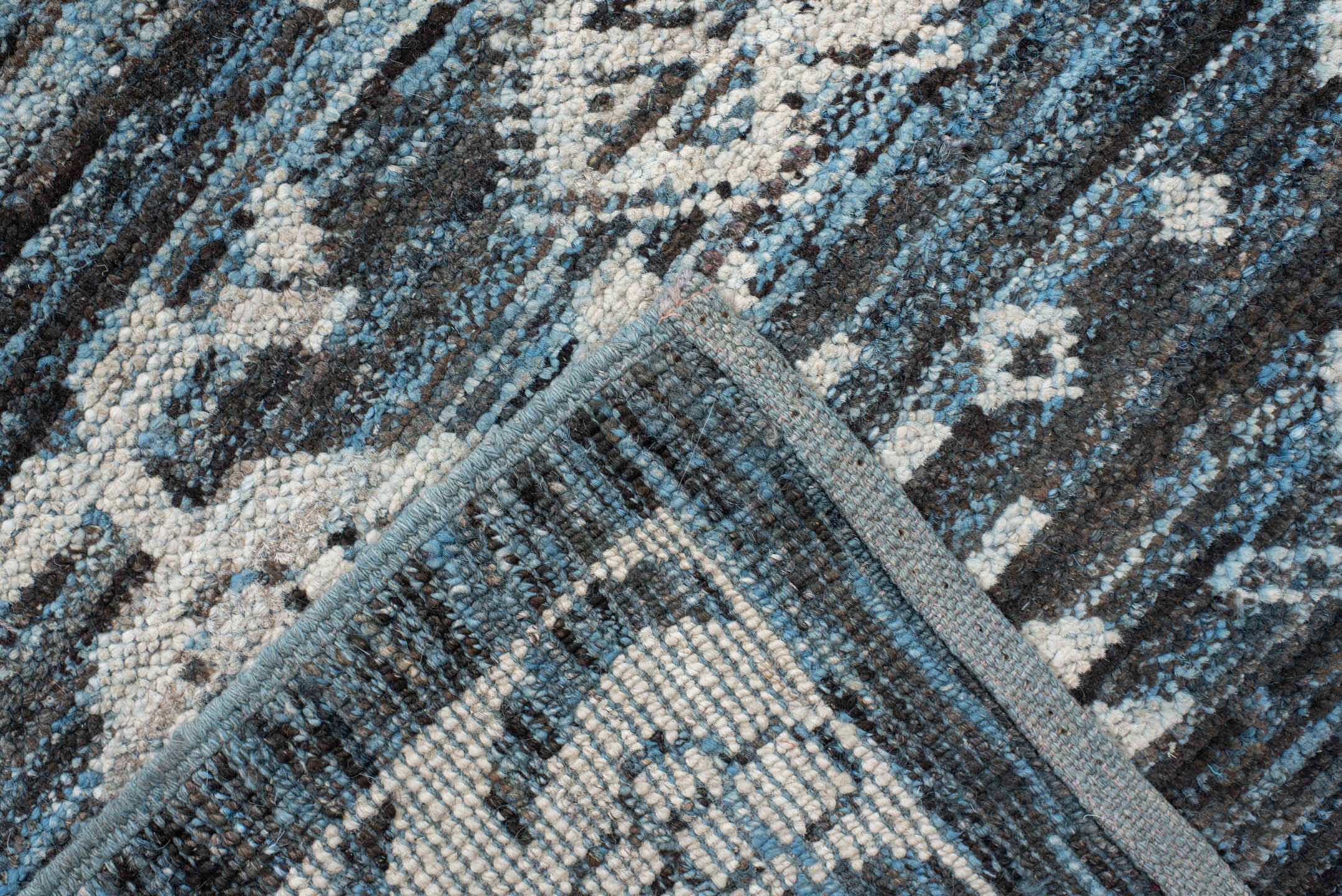 8' x 9' one-of-a-kind handmade vintage Oushak rug. Color palette: blue, ivory, charcoal, slate, cream, gray, black