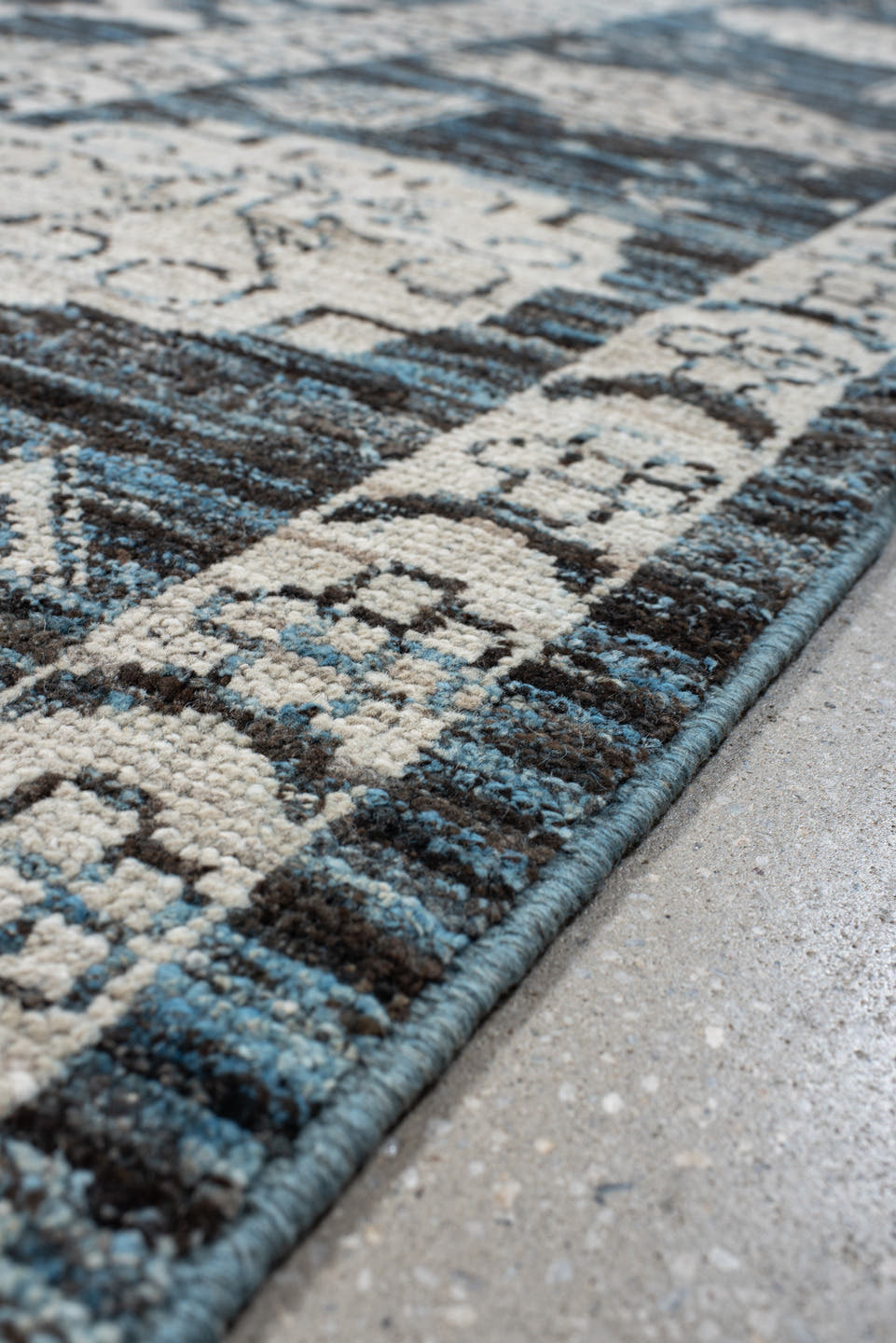 8' x 9' one-of-a-kind handmade vintage Oushak rug. Color palette: blue, ivory, charcoal, slate, cream, gray, black