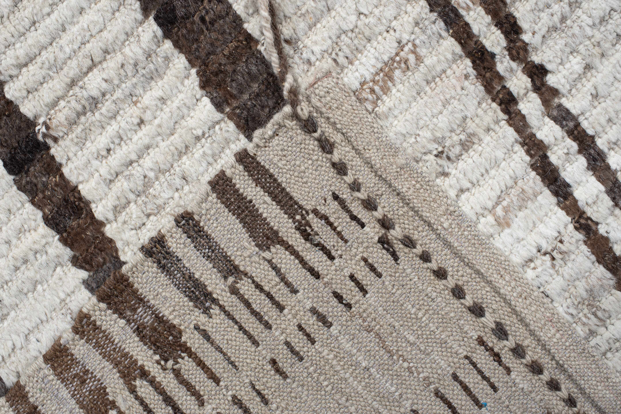 11' x 13' one-of-a-kind handmade vintage Tulu oversize rug. Color palette: ivory, brown, taupe, charcoal, beige, gray, black