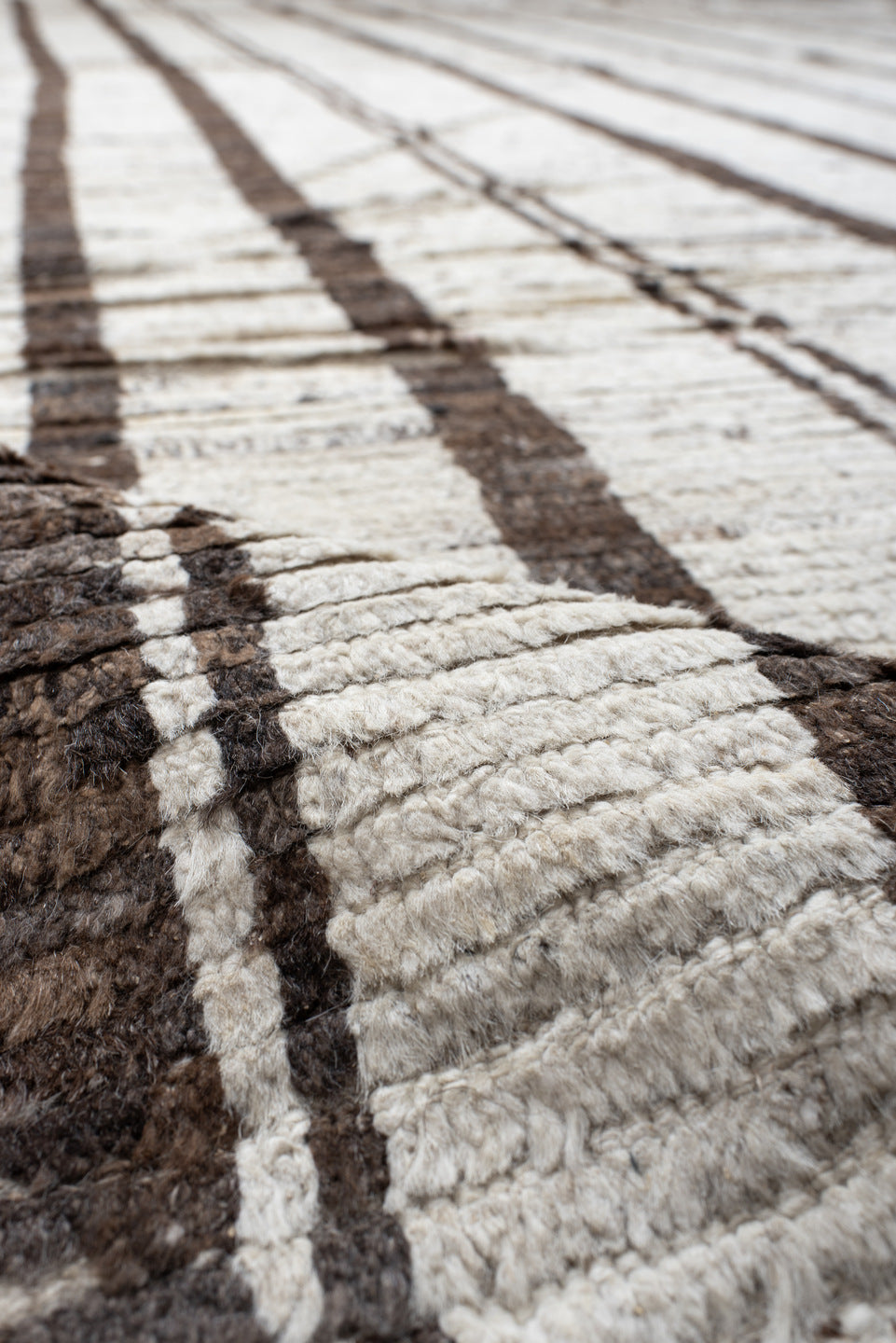 11' x 13' one-of-a-kind handmade vintage Tulu oversize rug. Color palette: ivory, brown, taupe, charcoal, beige, gray, black