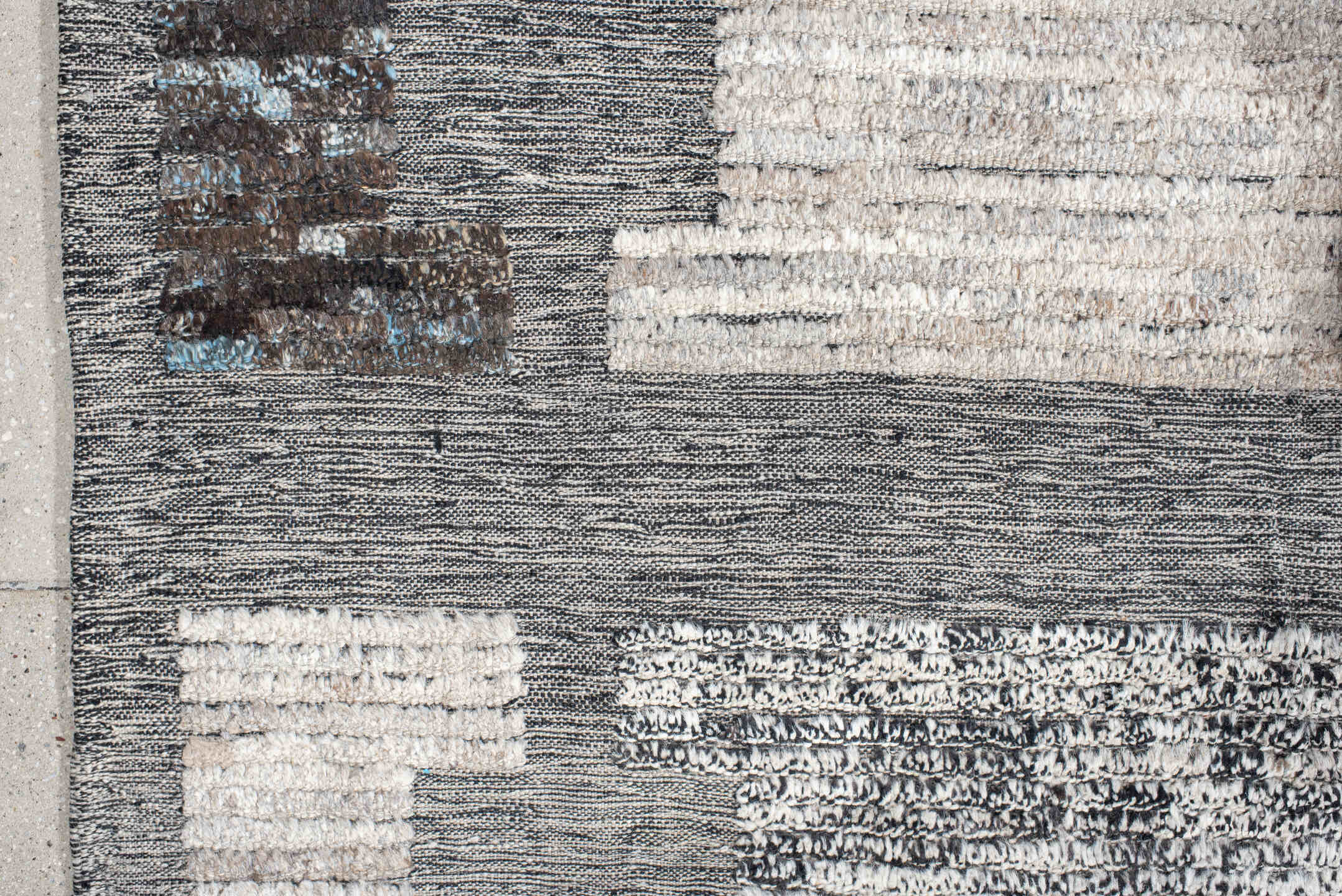11' x 12' one-of-a-kind handmade vintage Tulu oversize rug. Color palette: gray, ivory, charcoal, sky blue, cream, taupe