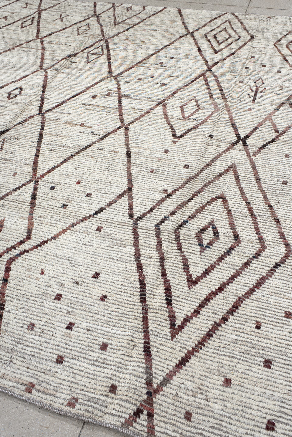 8' x 9' one-of-a-kind handmade vintage Tulu rug. Color palette: ivory, brown, taupe, charcoal, rose, beige, gray, black