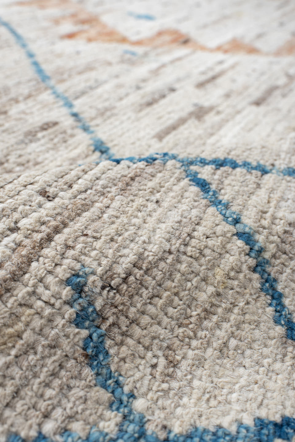 11' x 9' one-of-a-kind handmade vintage Tulu rug. Color palette: ivory, sky_blue, taupe, peach, blush, muted_gold, brown