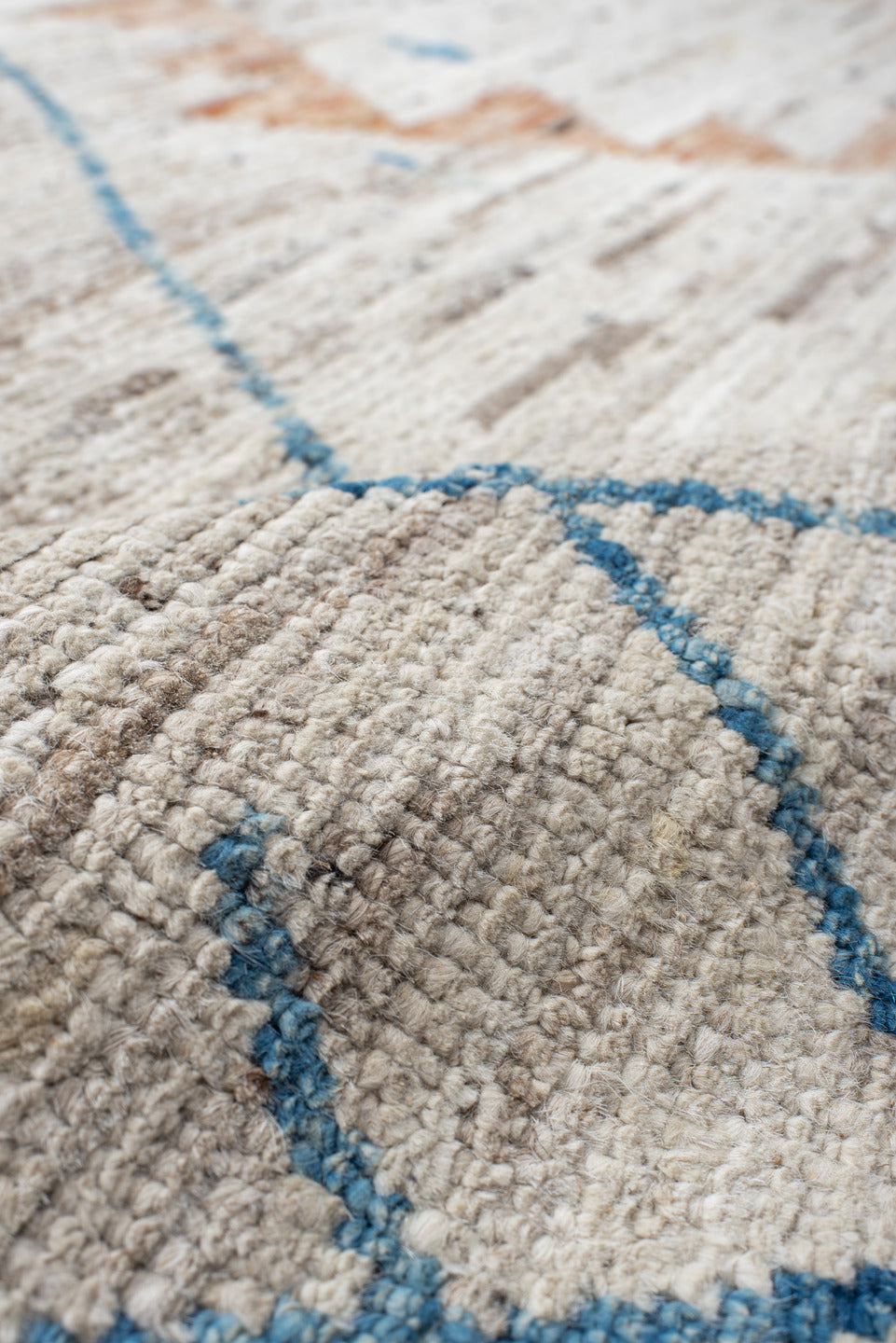 11' x 9' one-of-a-kind handmade vintage Tulu rug. Color palette: ivory, sky_blue, taupe, peach, blush, muted_gold, brown