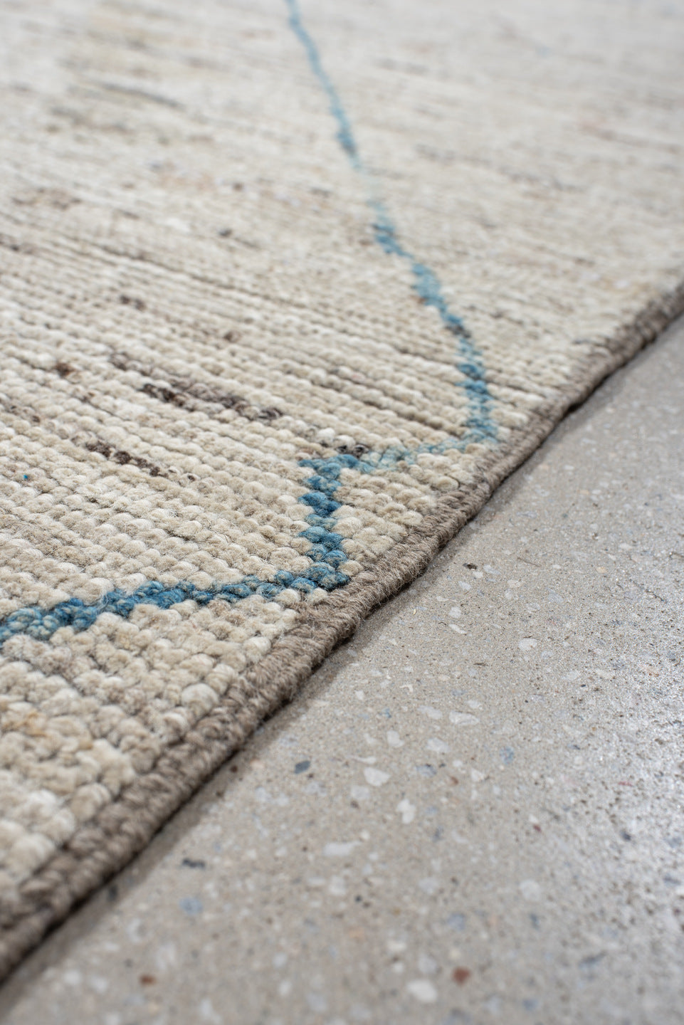 11' x 9' one-of-a-kind handmade vintage Tulu rug. Color palette: ivory, sky_blue, taupe, peach, blush, muted_gold, brown