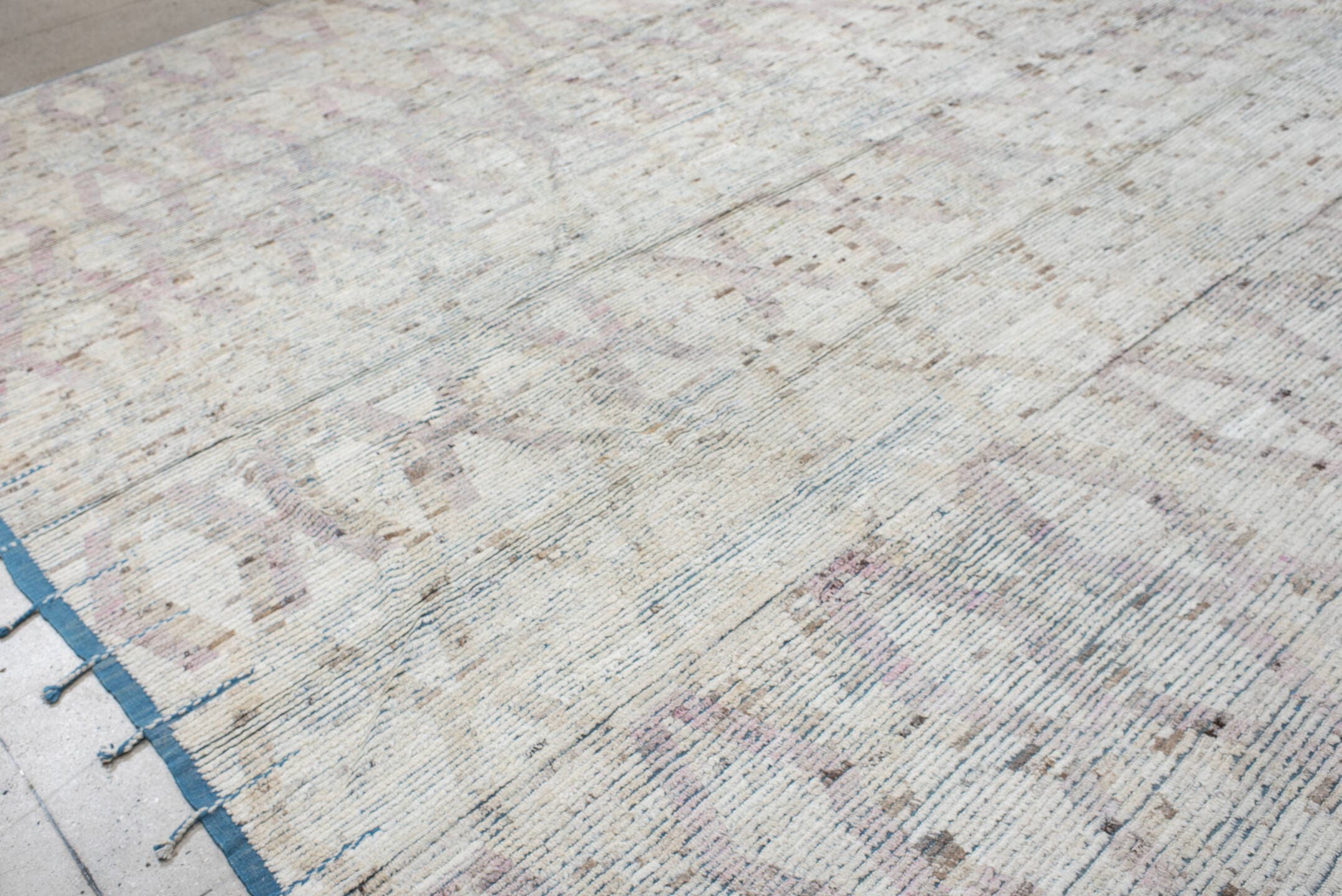 14' x 15' one-of-a-kind handmade vintage Tulu oversize rug. Color palette: ivory, pale blue, blush, taupe, beige, brown