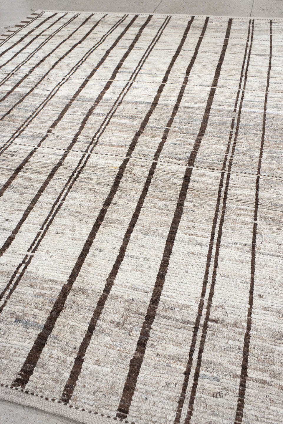 8' x 12' one-of-a-kind handmade vintage Tulu large size rug. Color palette: ivory, brown, taupe, gray, beige