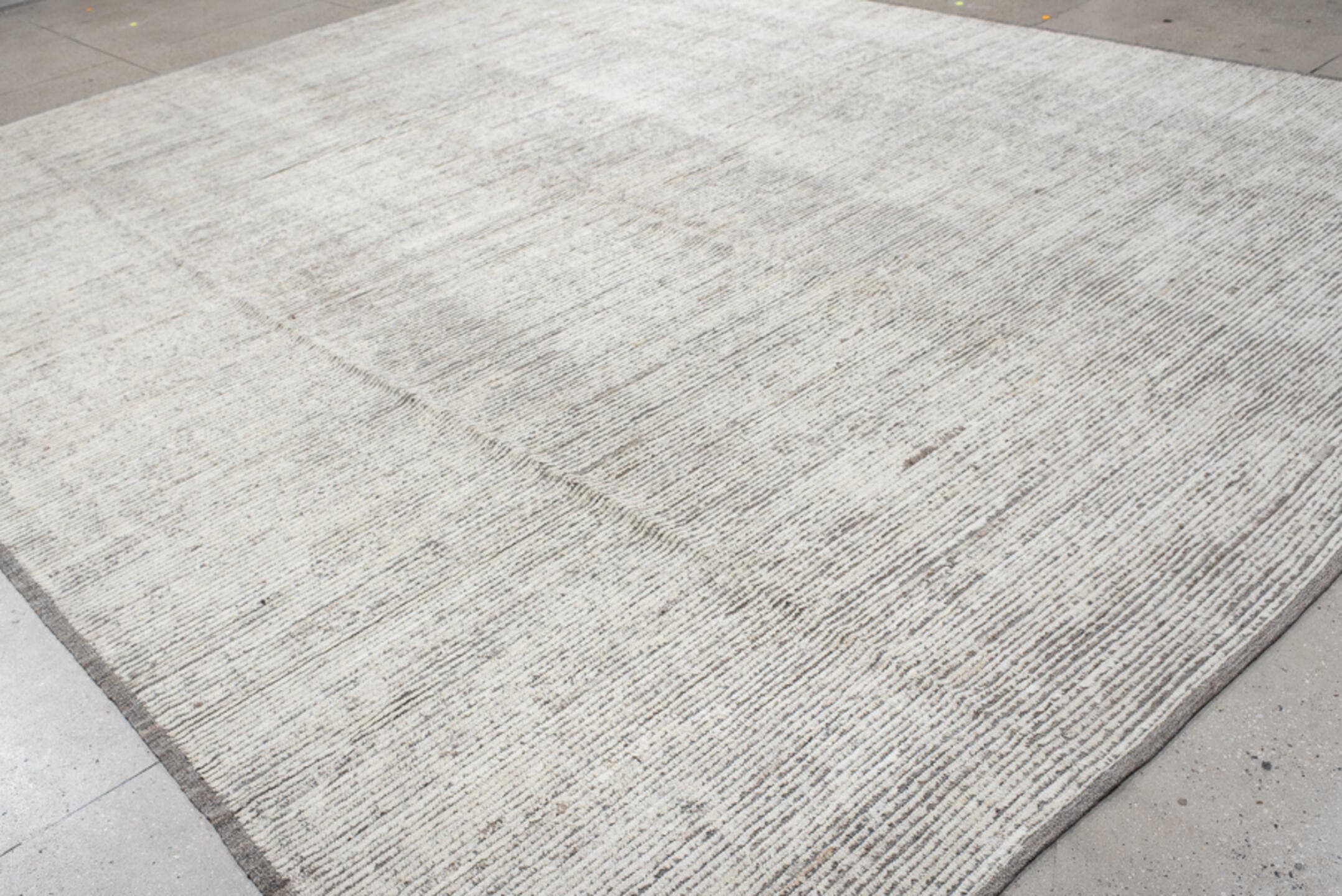 11' x 14' one-of-a-kind handmade vintage Tulu oversize rug. Color palette: ivory, taupe, gray, cream, charcoal, beige, black