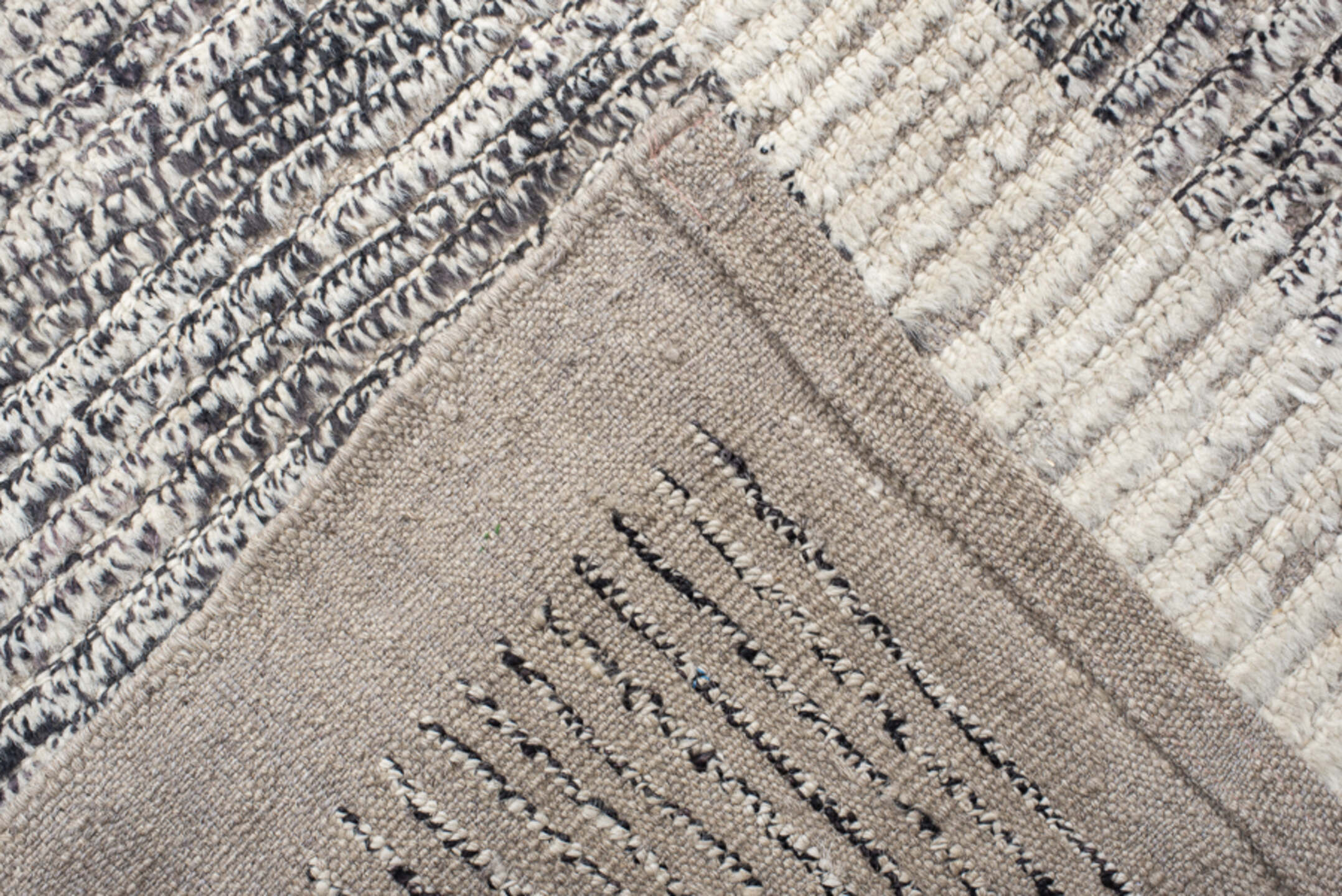 12' x 17' one-of-a-kind handmade vintage Tulu oversize rug. Color palette: gray, ivory, charcoal, taupe, black, beige
