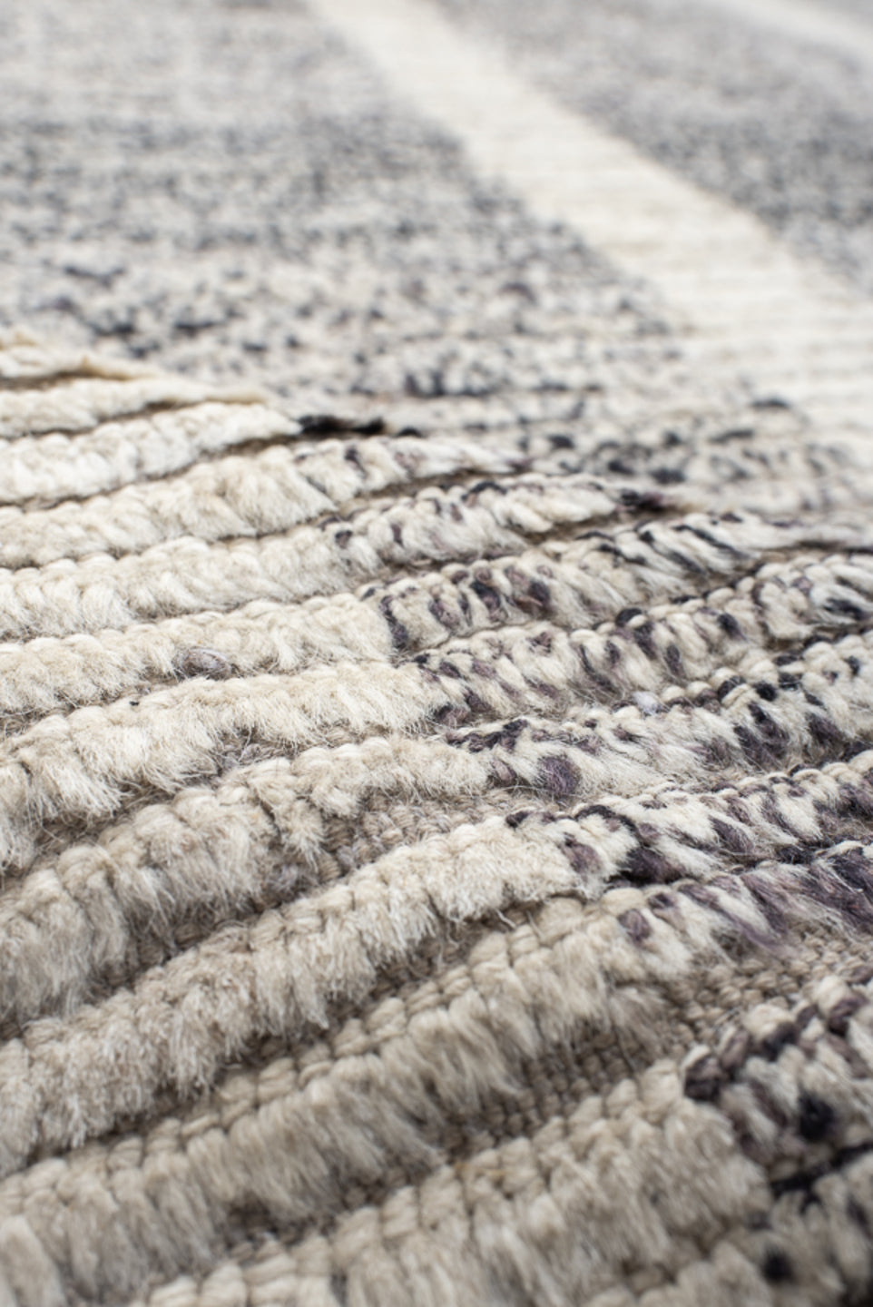 12' x 17' one-of-a-kind handmade vintage Tulu oversize rug. Color palette: gray, ivory, charcoal, taupe, black, beige