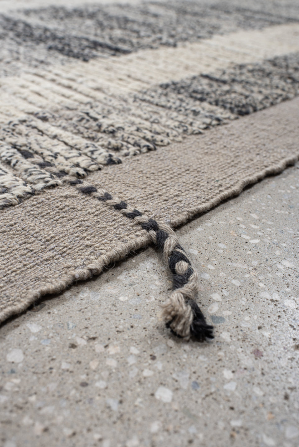 12' x 17' one-of-a-kind handmade vintage Tulu oversize rug. Color palette: gray, ivory, charcoal, taupe, black, beige