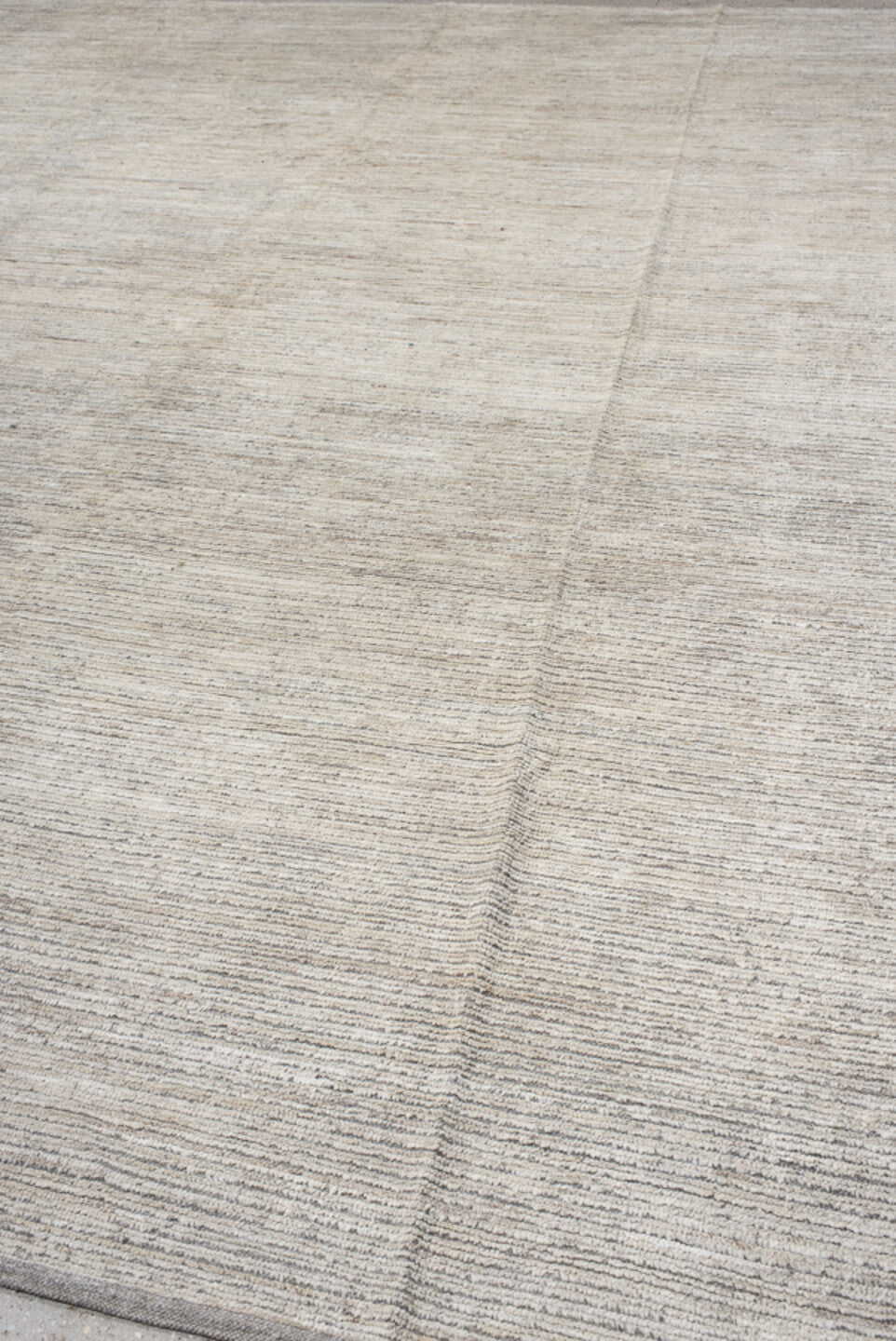 12' x 14' one-of-a-kind handmade vintage Tulu oversize rug. Color palette: ivory, taupe, gray, cream, beige