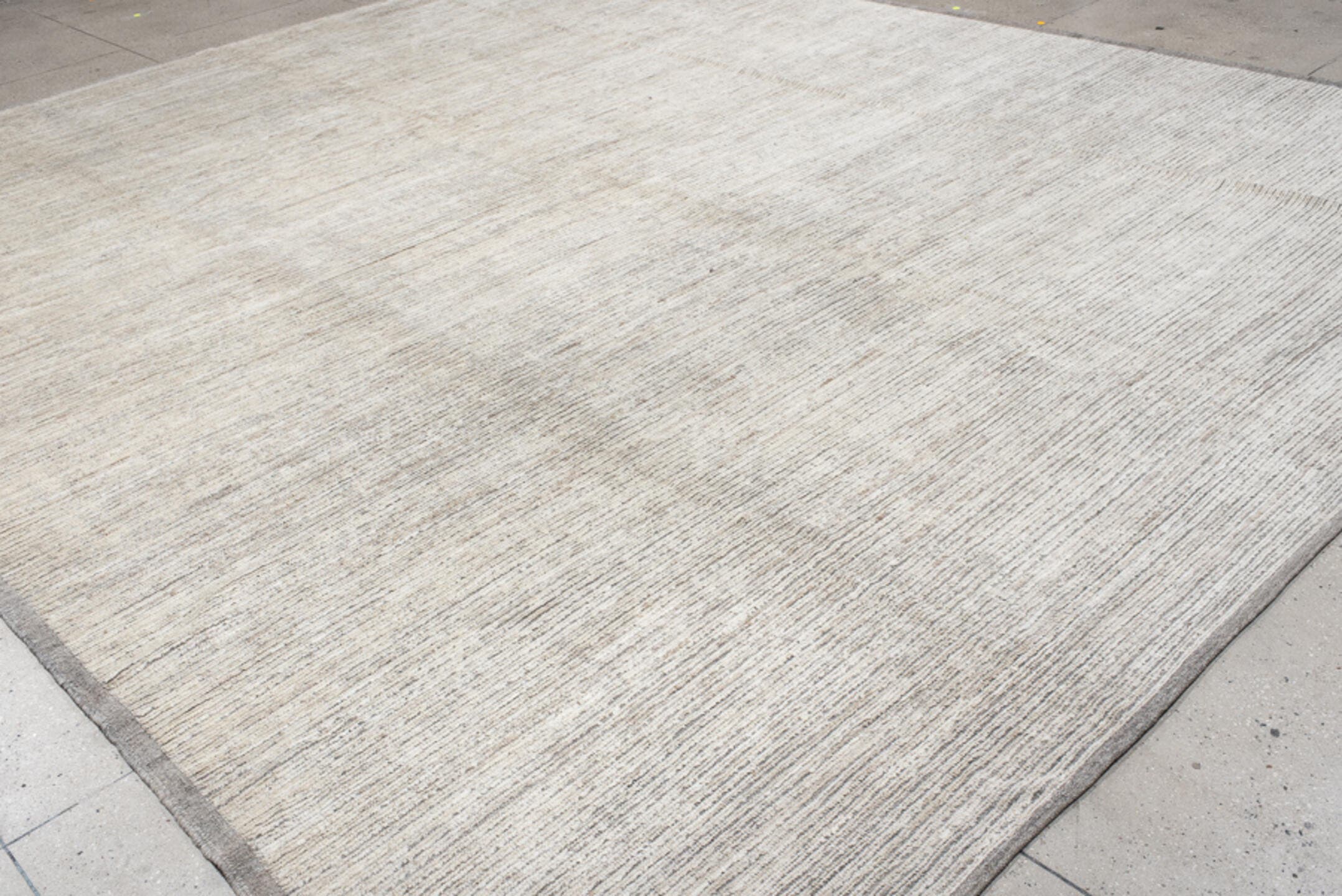 12' x 14' one-of-a-kind handmade vintage Tulu oversize rug. Color palette: ivory, taupe, gray, cream, beige