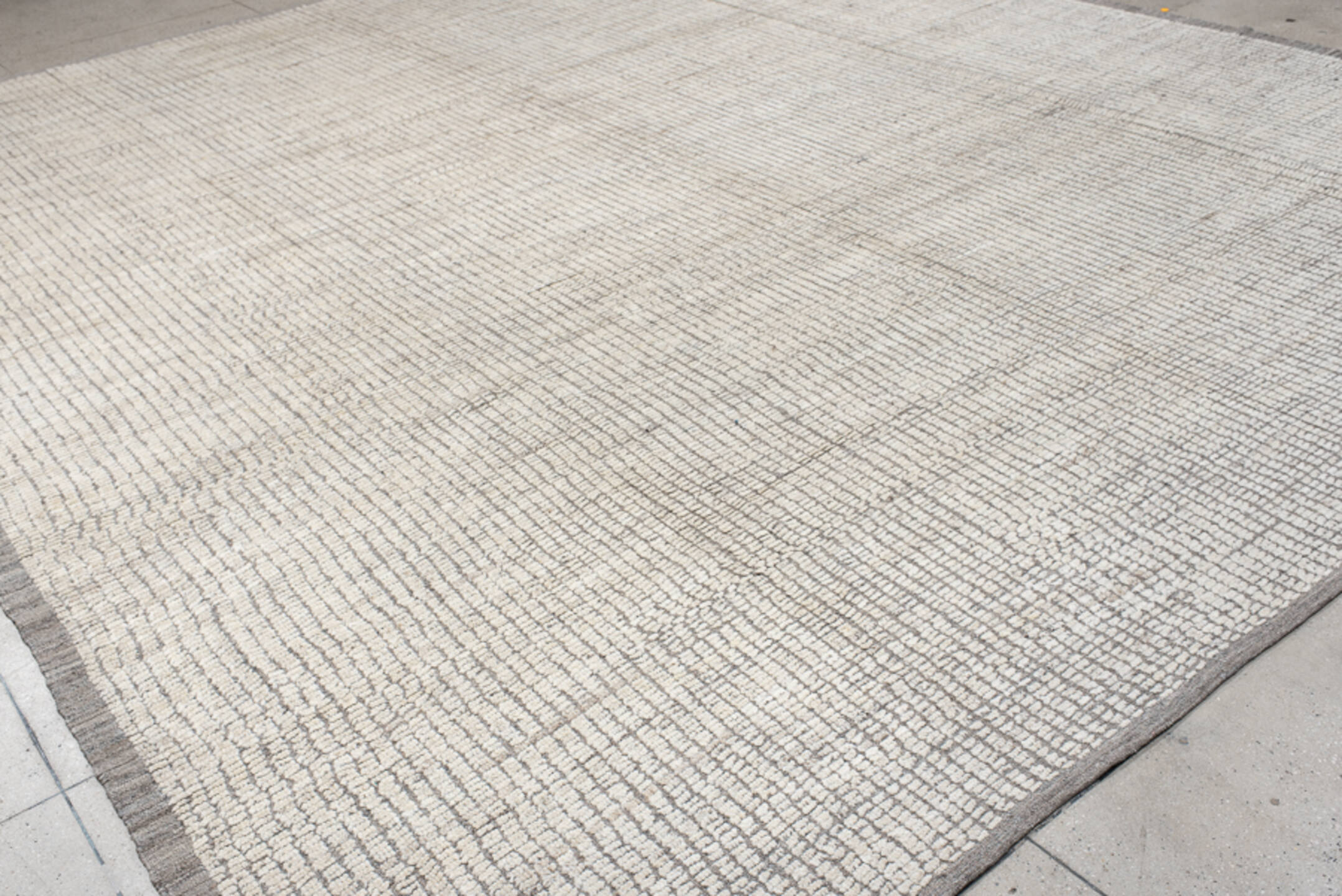 12' x 14' one-of-a-kind handmade vintage Tulu oversize rug. Color palette: ivory, taupe, gray, cream, beige