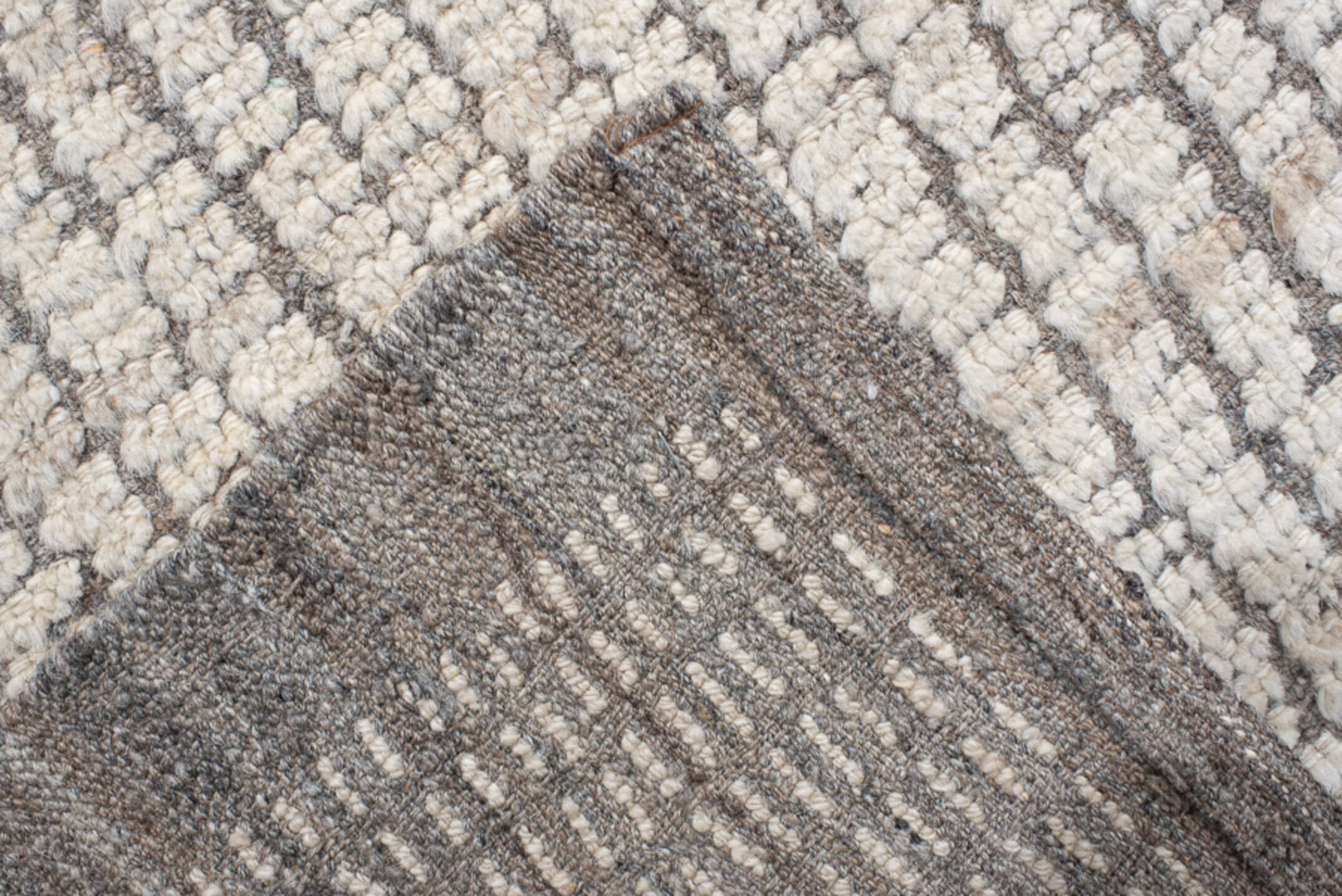 12' x 14' one-of-a-kind handmade vintage Tulu oversize rug. Color palette: ivory, taupe, gray, cream, beige