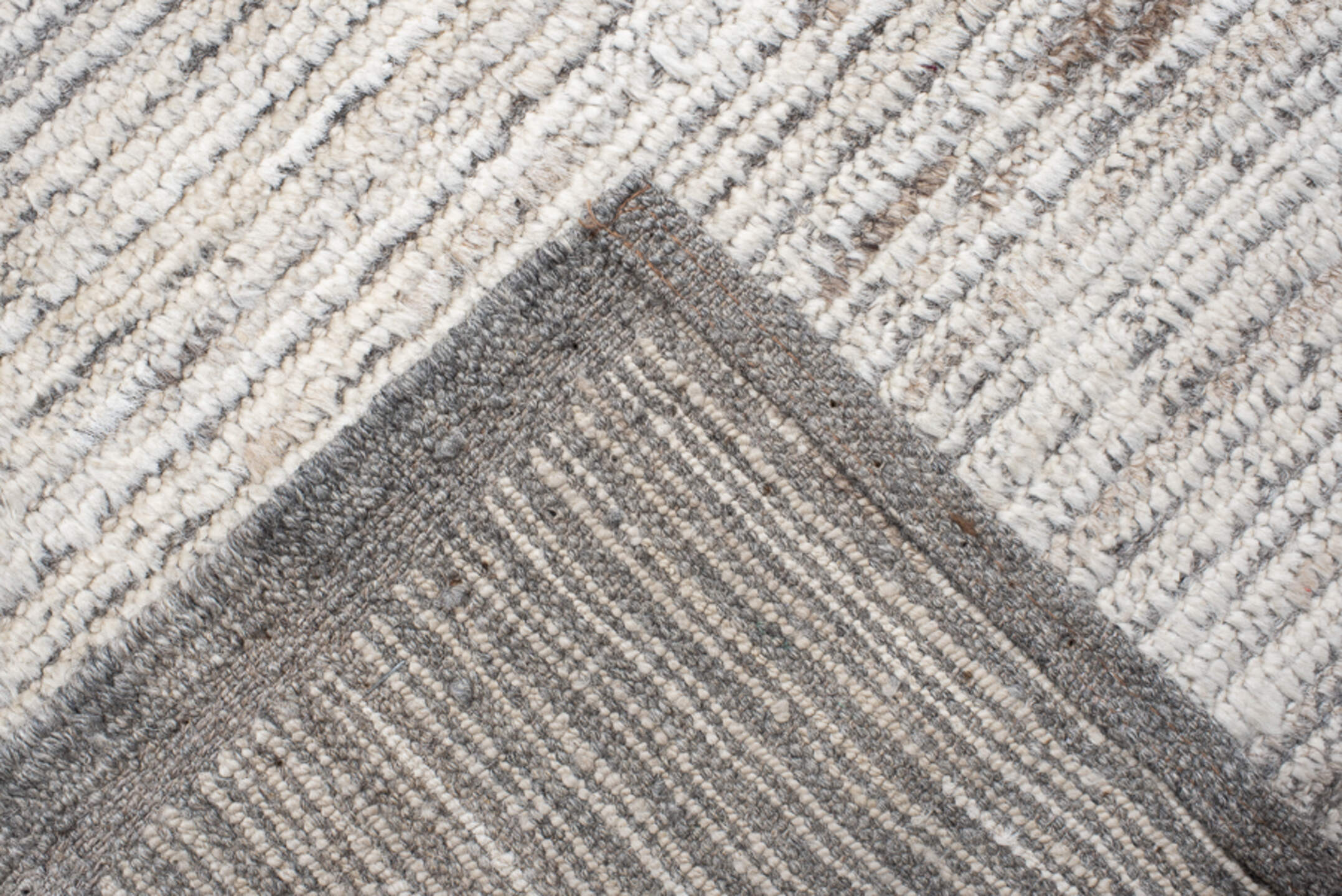 12' x 15' one-of-a-kind handmade vintage Tulu oversize rug. Color palette: ivory, gray, taupe, charcoal, cream, beige, black