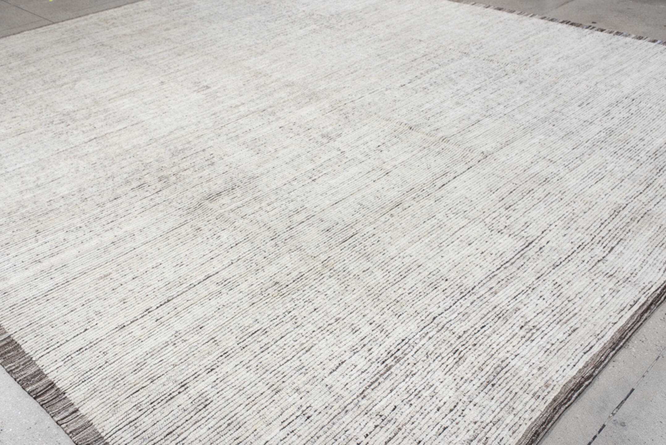 12' x 14' one-of-a-kind handmade vintage Tulu oversize rug. Color palette: ivory, charcoal, taupe, cream, gray, black, beige