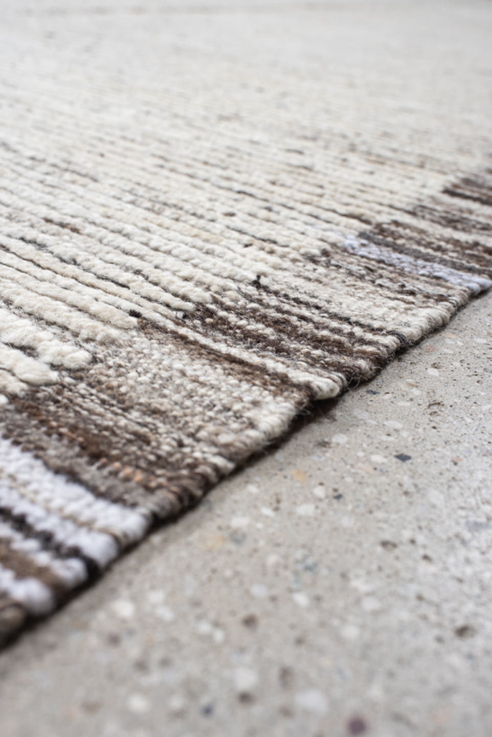 12' x 14' one-of-a-kind handmade vintage Tulu oversize rug. Color palette: ivory, charcoal, taupe, cream, gray, black, beige