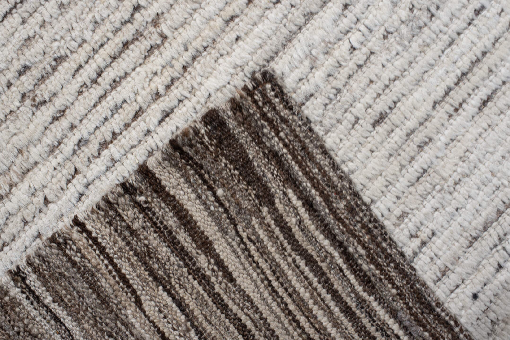 12' x 14' one-of-a-kind handmade vintage Tulu oversize rug. Color palette: ivory, taupe, brown, charcoal, beige, gray, black