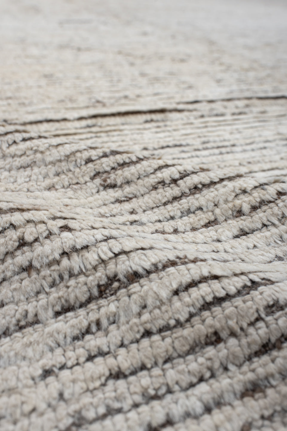 12' x 14' one-of-a-kind handmade vintage Tulu oversize rug. Color palette: ivory, taupe, brown, charcoal, beige, gray, black