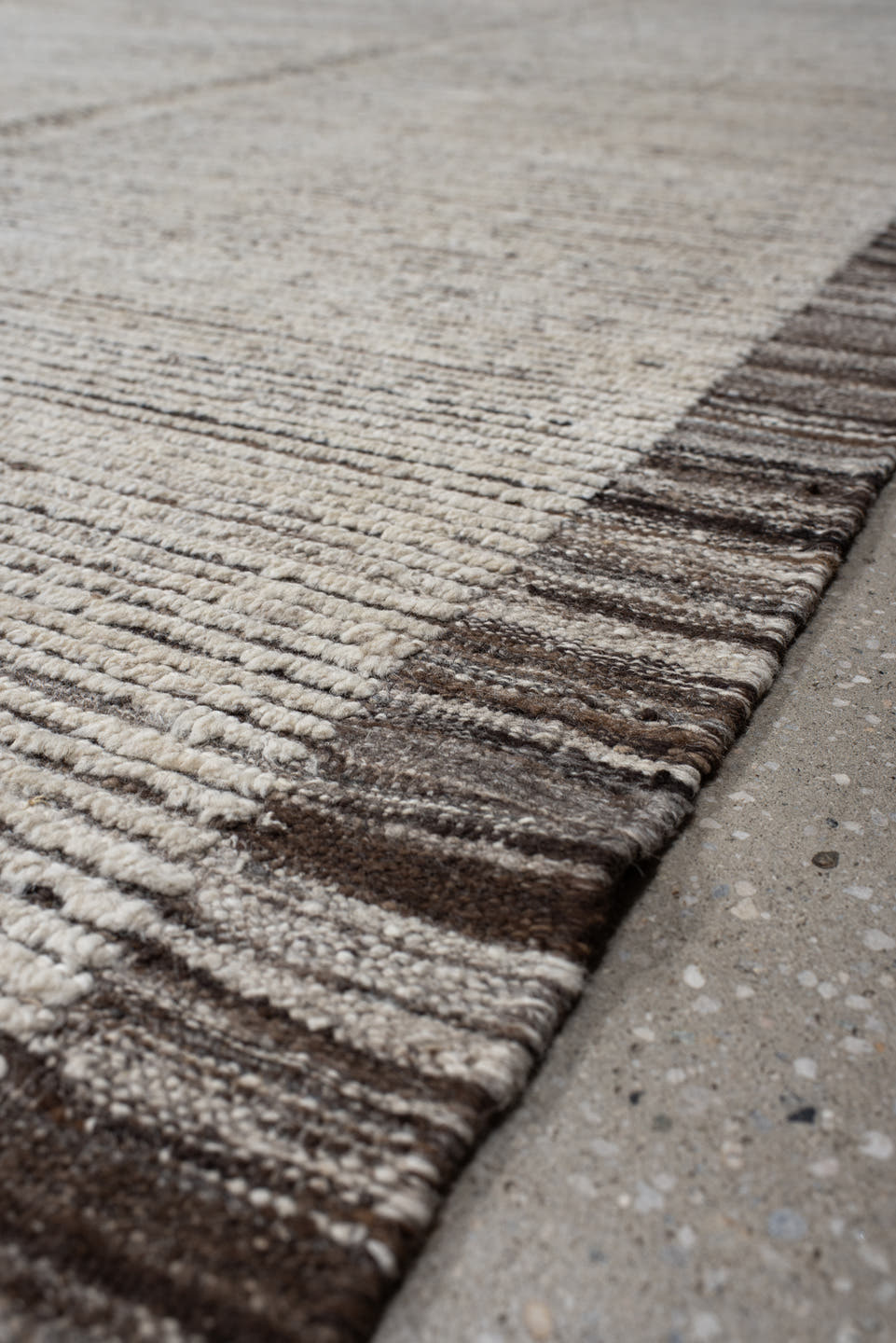 12' x 14' one-of-a-kind handmade vintage Tulu oversize rug. Color palette: ivory, taupe, brown, charcoal, beige, gray, black