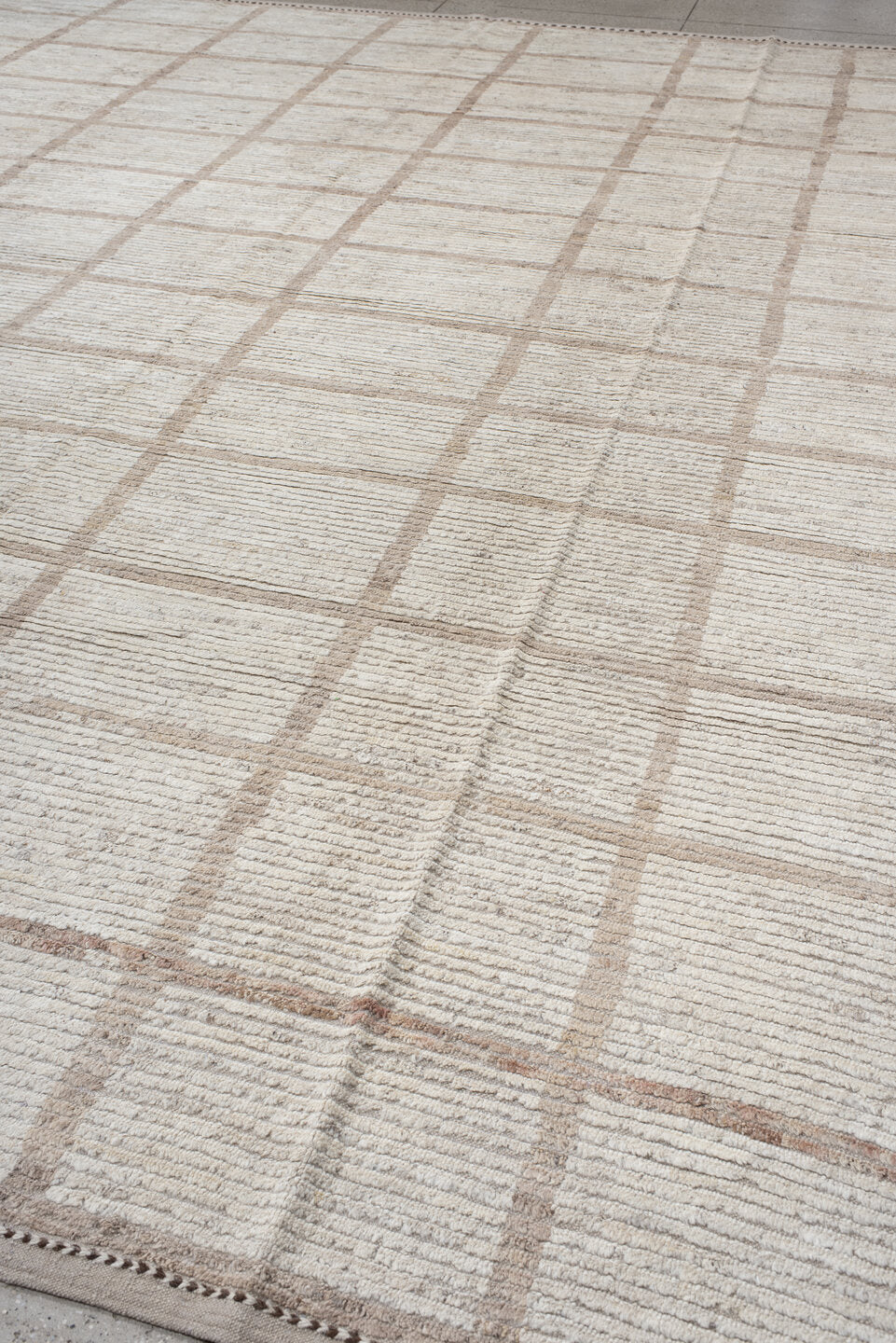 12' x 15' one-of-a-kind handmade vintage Tulu oversize rug. Color palette: ivory, taupe, cream, beige, camel, gray