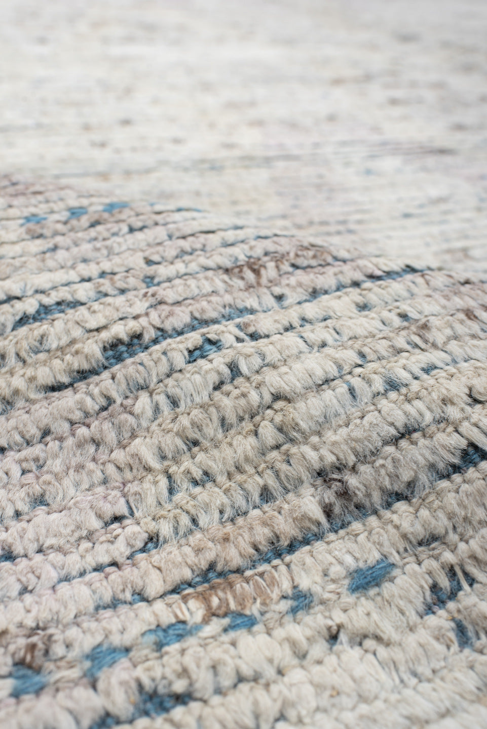 13' x 14' one-of-a-kind handmade vintage Tulu oversize rug. Color palette: ivory, slate, taupe, pale lavender, charcoal