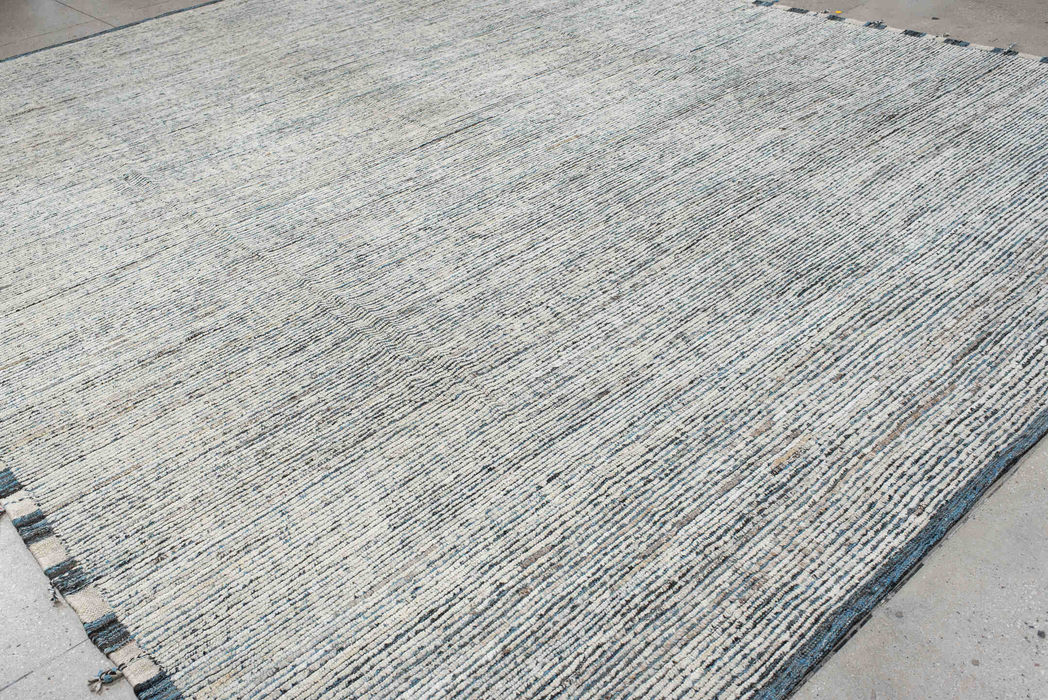 12' x 14' one-of-a-kind handmade vintage Tulu oversize rug. Color palette: ivory, slate, charcoal, taupe, gray, black, beige