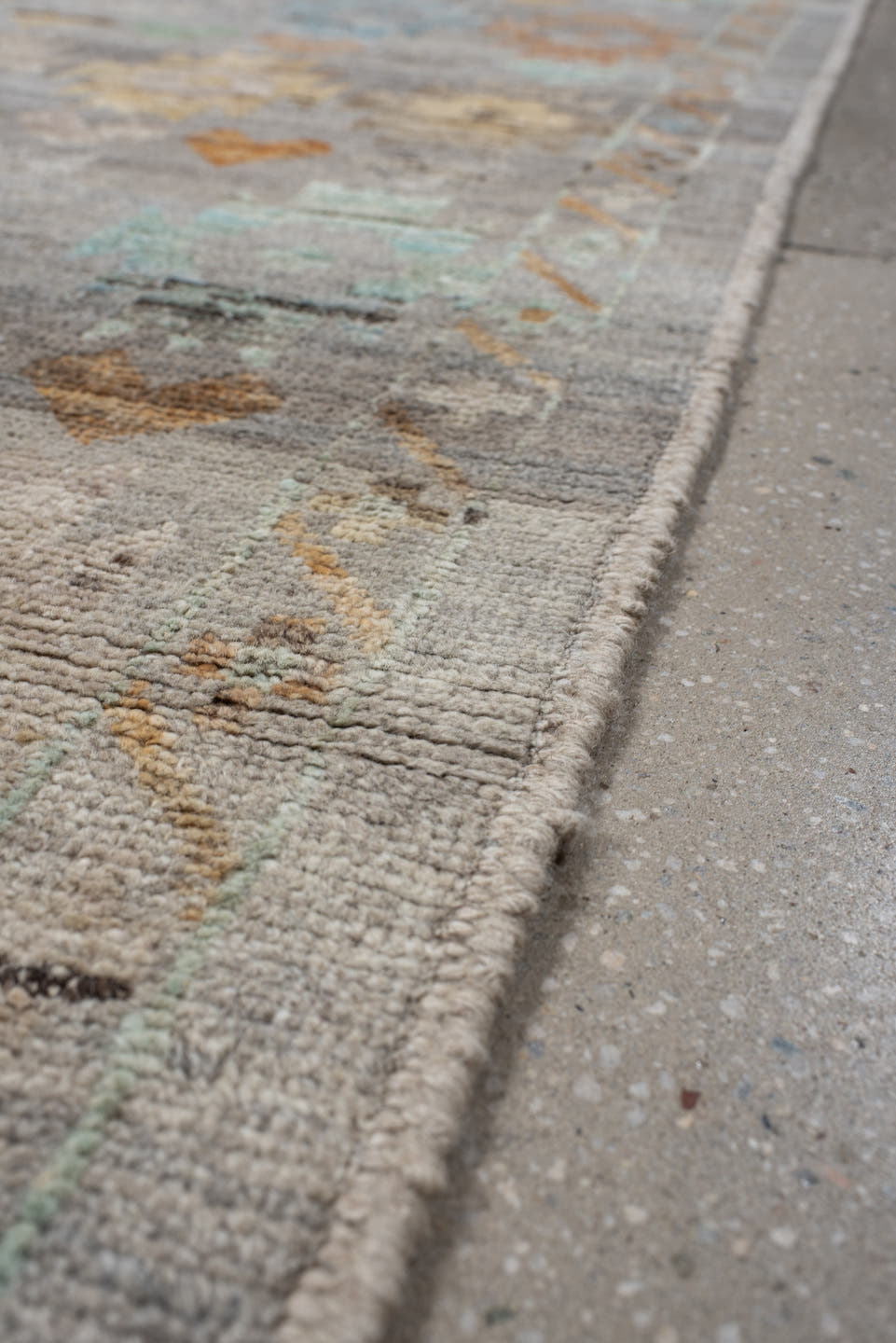 2' x 10' one-of-a-kind handmade vintage Tulu runner rug. Color palette: gray, ivory, aqua, apricot, taupe, charcoal, sand