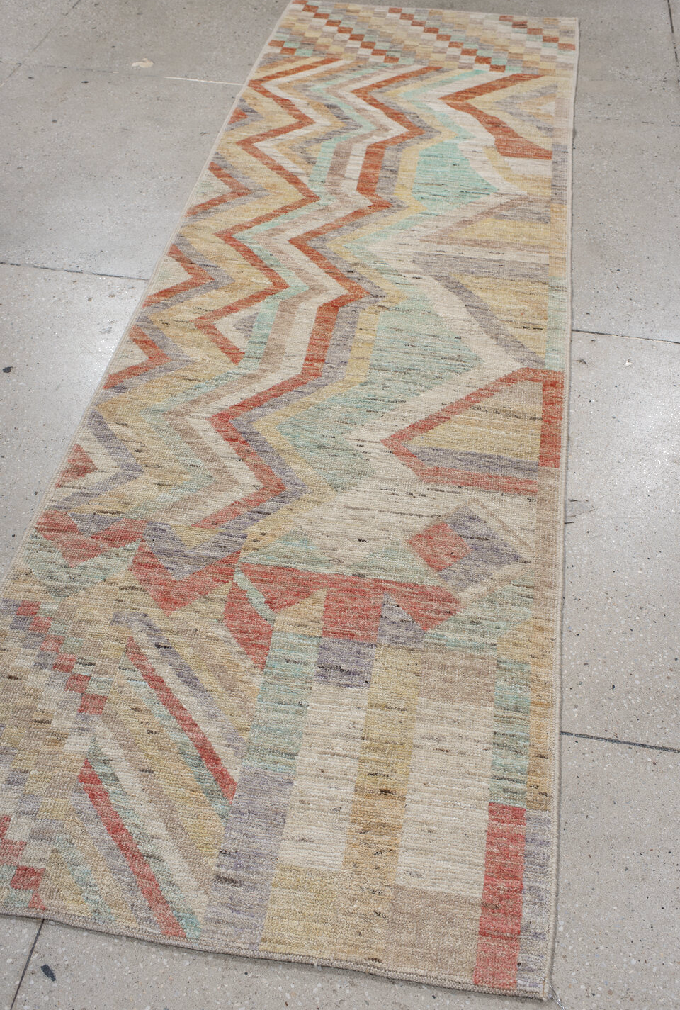 3' x 9' one-of-a-kind handmade vintage Tulu runner rug. Color palette: brown, gray, light gray, off-white, orange, pink